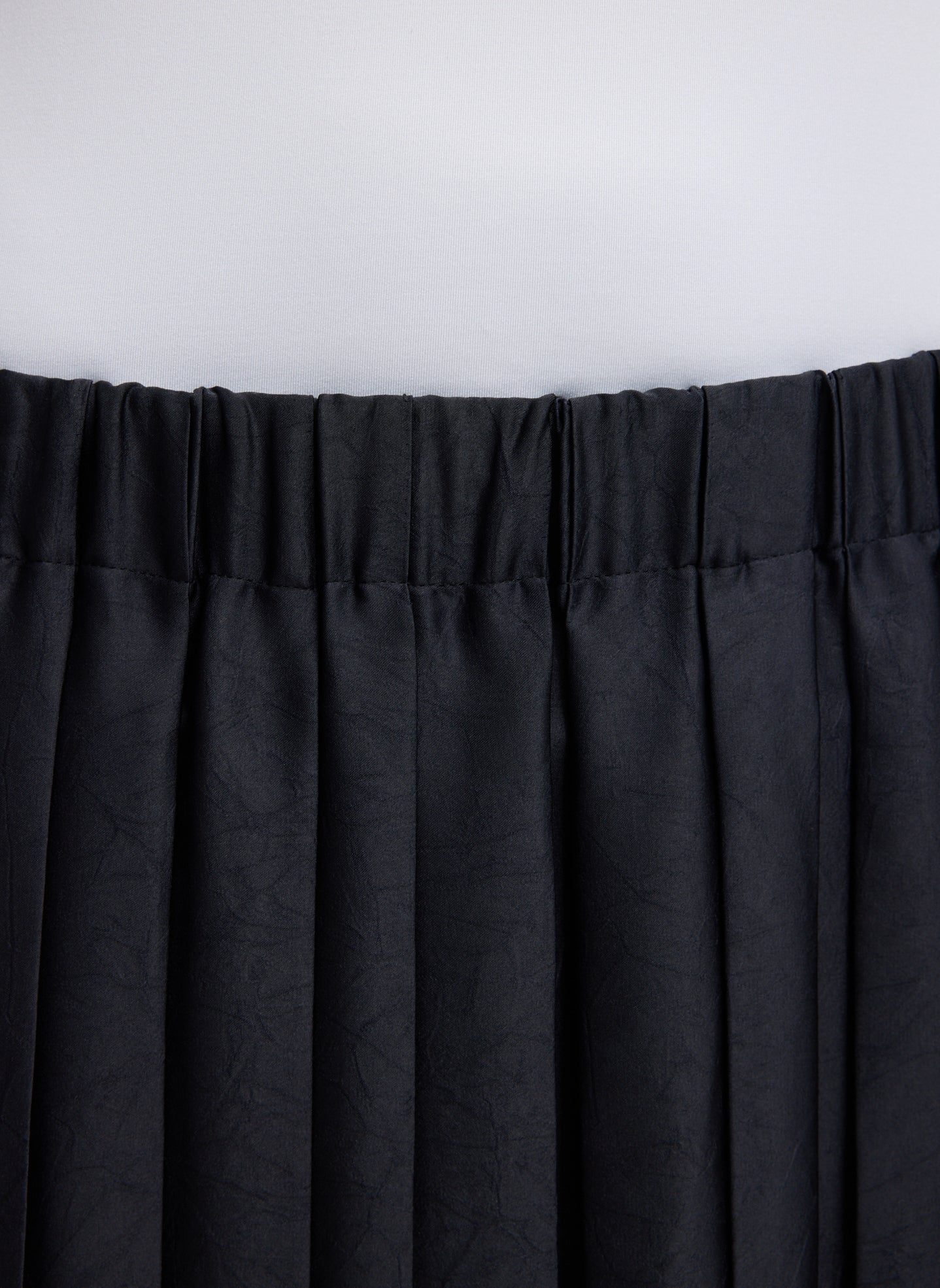 Black Feather Weight Pleated Pull On Skirt - closeup of waistband detail