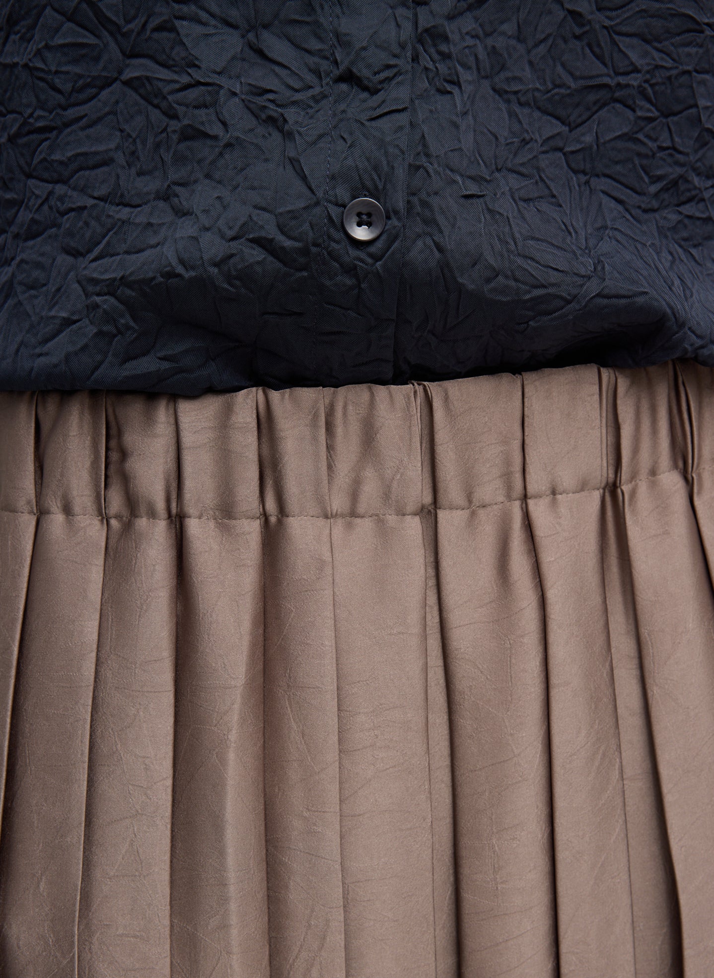 Dark Stone Feather Weight Pleated Pull On Skirt - closeup of waistband