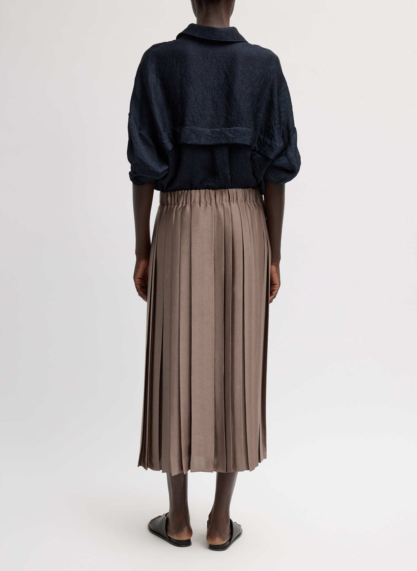 Dark Stone Feather Weight Pleated Pull On Skirt - pleated midi skirt, back view on model