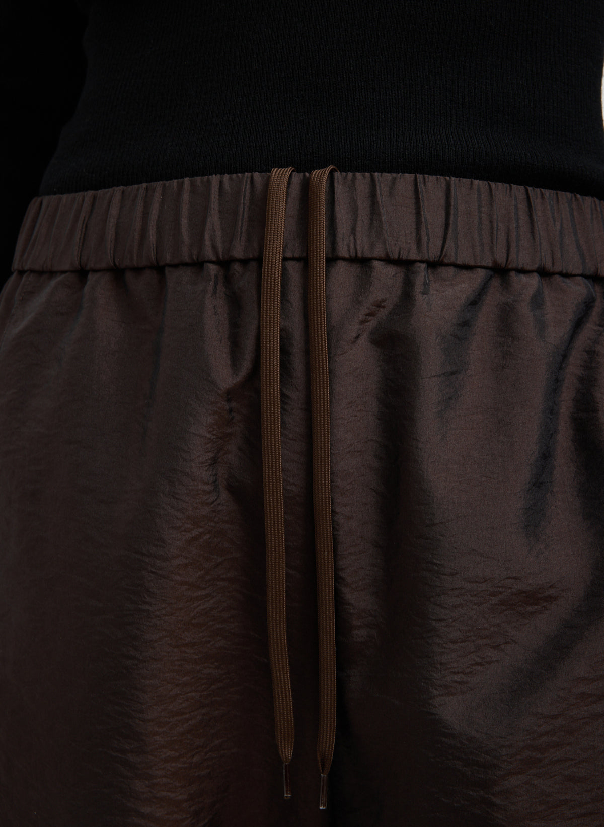 Dark Brown Crispy Nylon Winslow Pant - closeup of drawstring detail at waistband