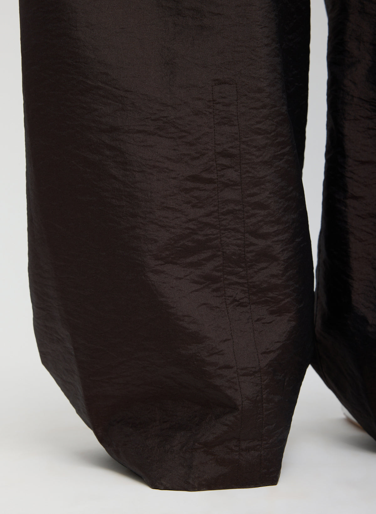 Dark Brown Crispy Nylon Winslow Pant - closeup of snap details at hem
