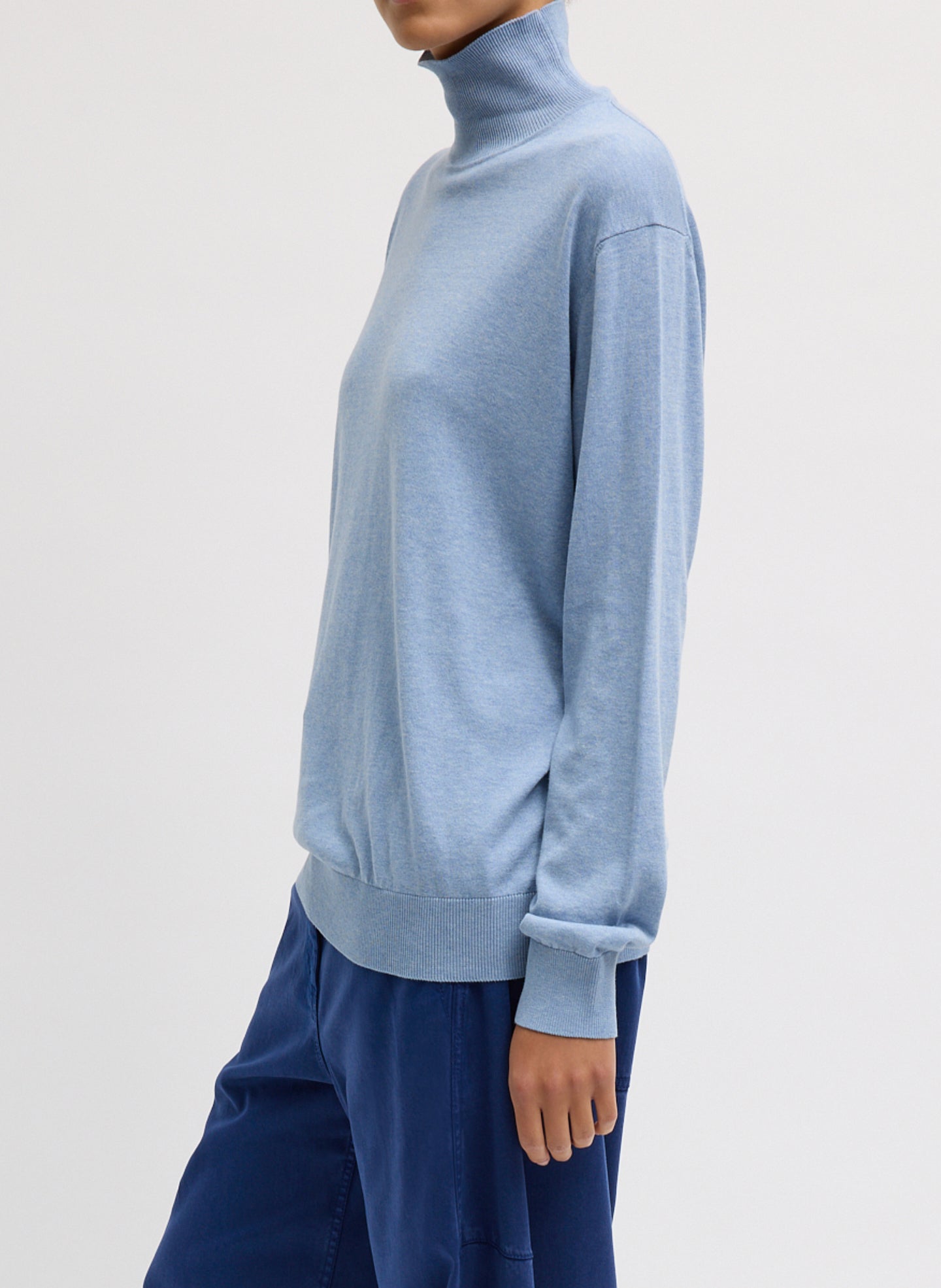 Blue Melange Super Fine Gauge Turtleneck - thin turtleneck top, side view on model