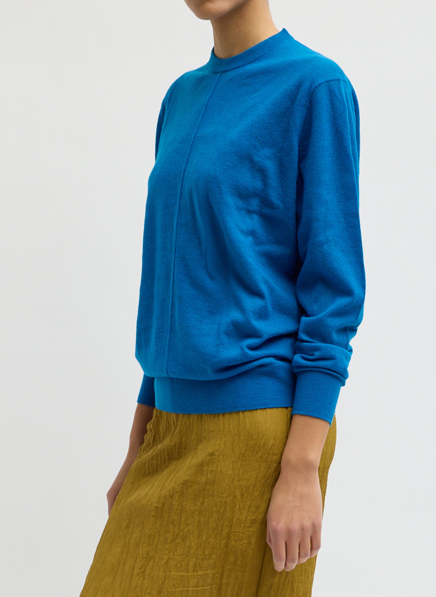 Bright Blue Skinlike Mercerized Wool Crewneck Pullover - sweater, side view on model