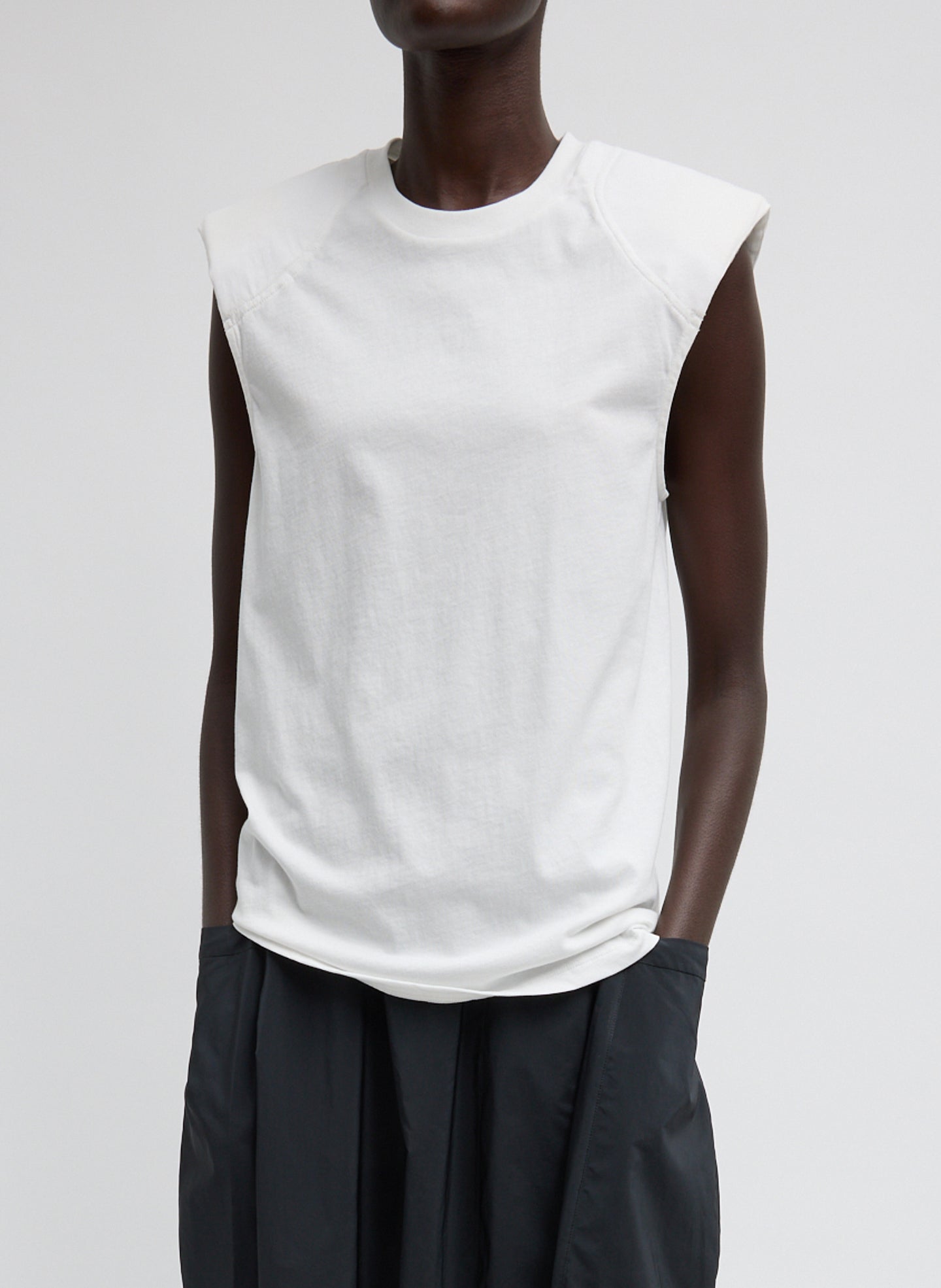 T-Shirt Program Padded Shoulder Sleeveless Top - White T-Shirt Program Padded Shoulder Sleeveless Top - front view on model