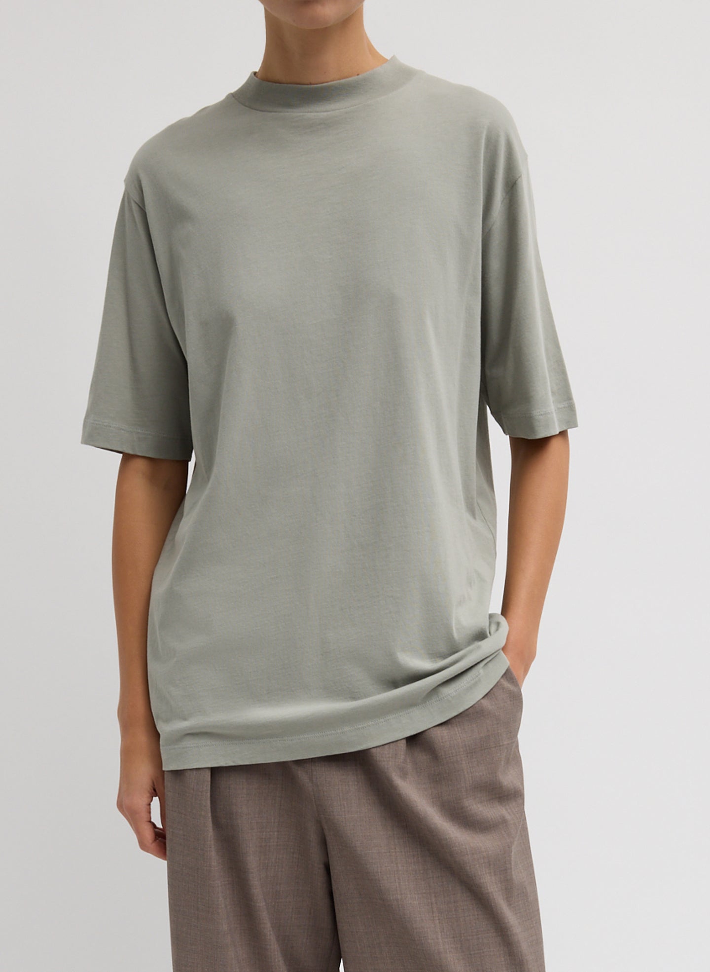 Pumice Grey Mock Neck Unisex T-Shirt - oversized t-shirt, front view on model