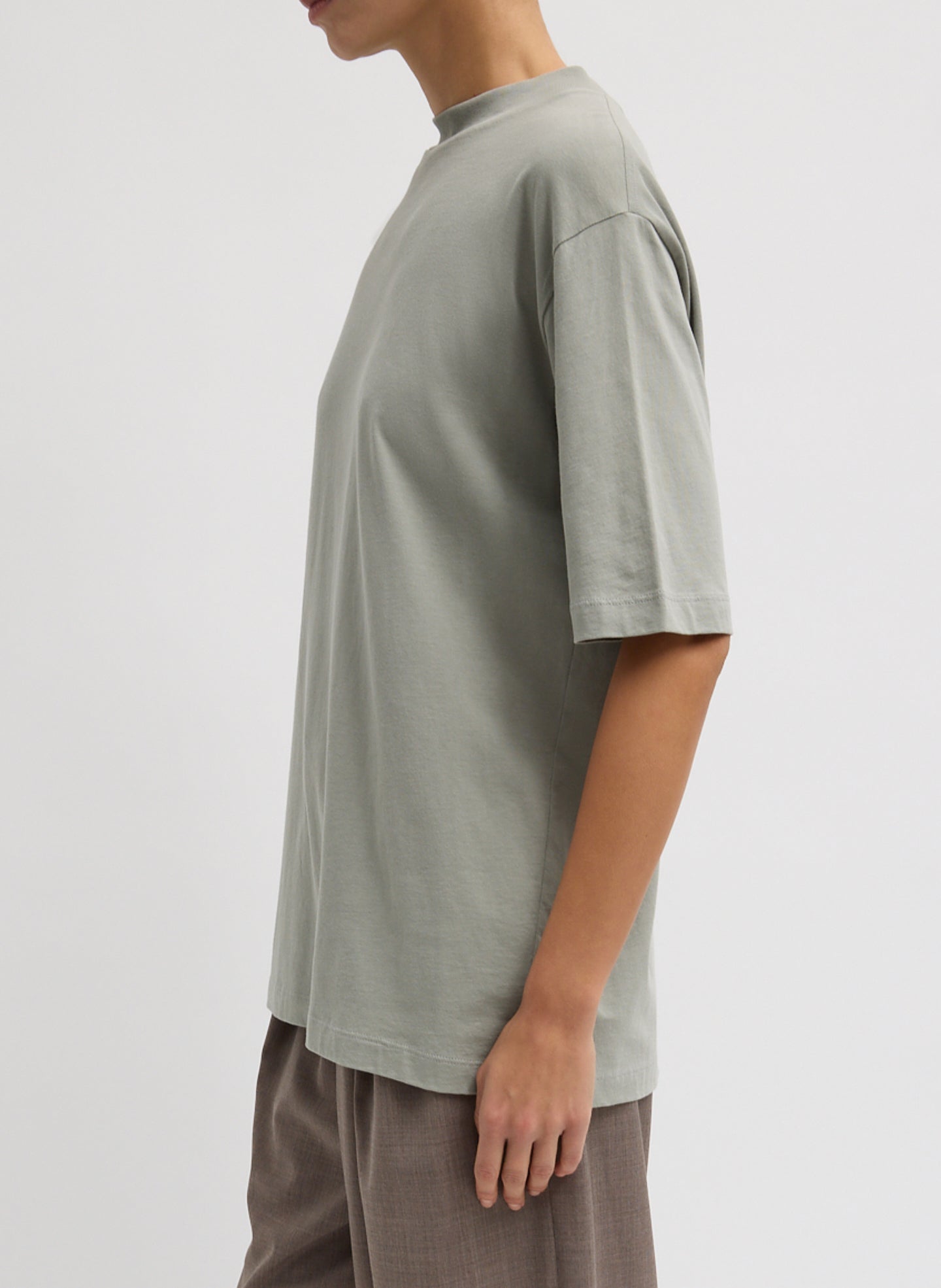 Pumice Grey Mock Neck Unisex T-Shirt - oversized t-shirt, side view on model