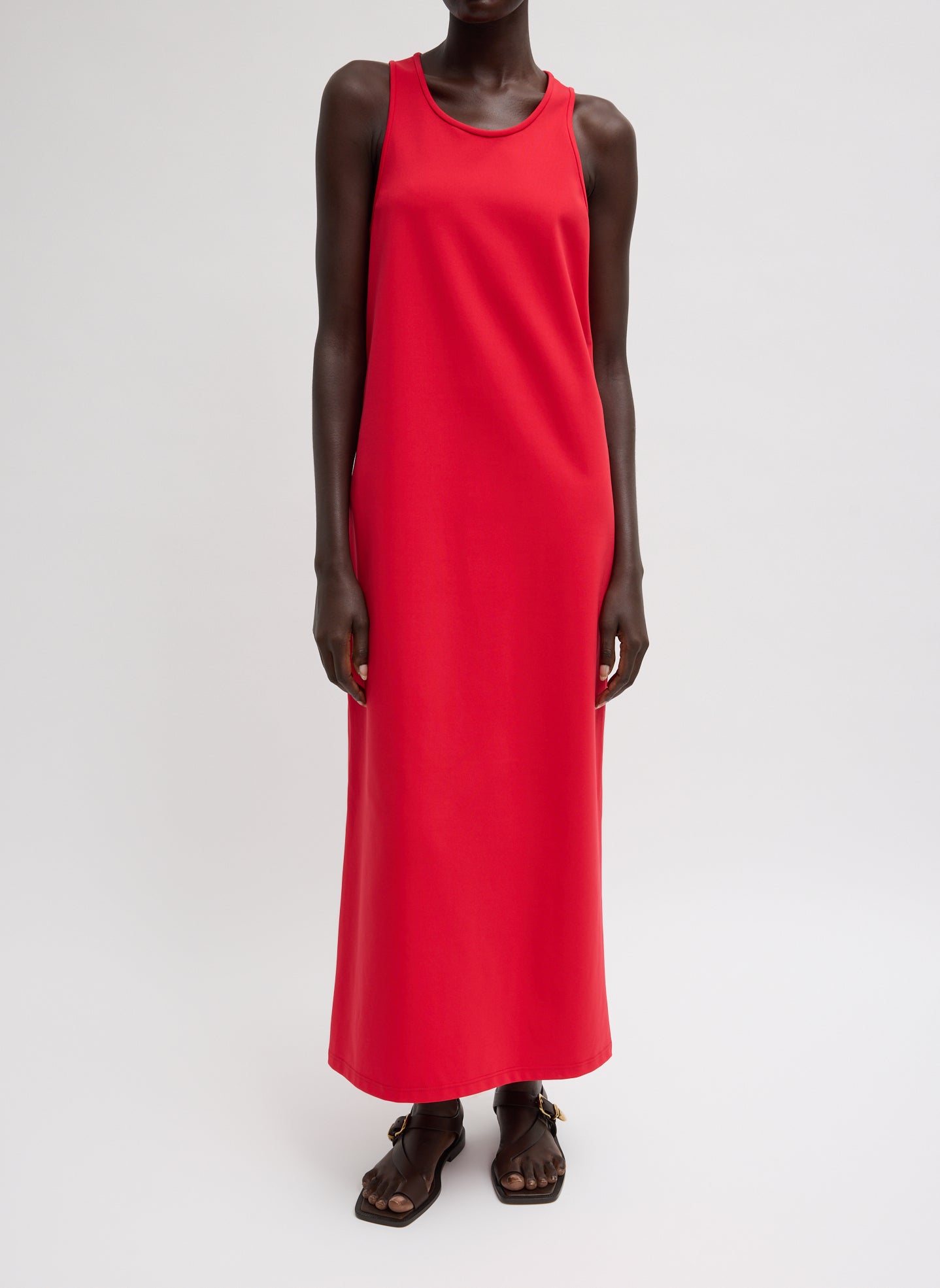 Compact Ultra Stretch Knit Sleeveless Dress - Red Compact Ultra Stretch Knit Sleeveless Maxi Dress - front view on model
