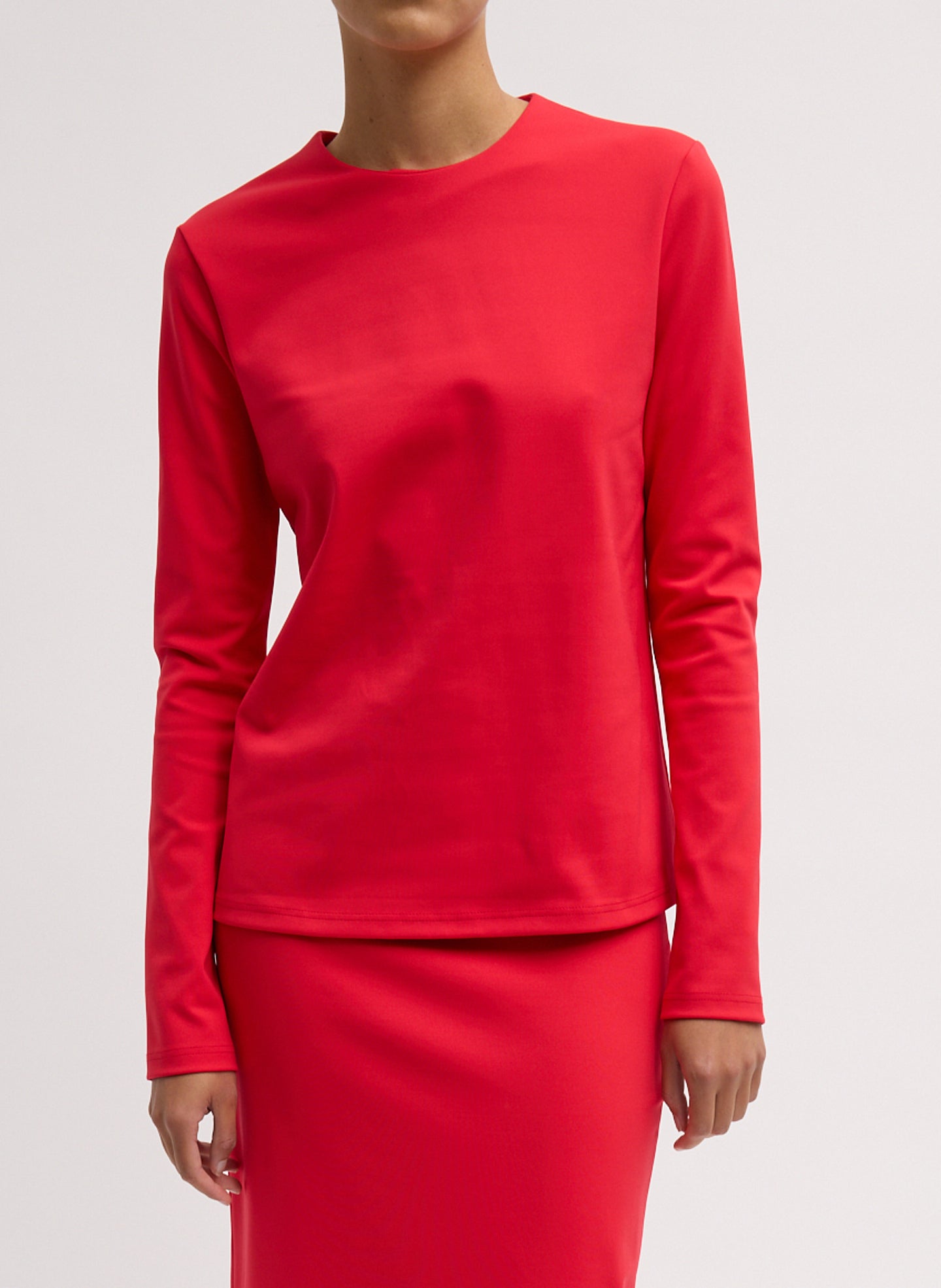 Compact Ultra Stretch Knit Long Sleeve Top - front view on model