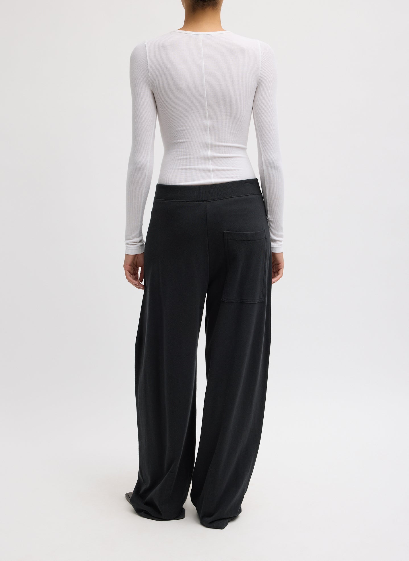 Black Light Weight Sweatshirting Winslow Pant - barrel leg sweatpant, back view on model