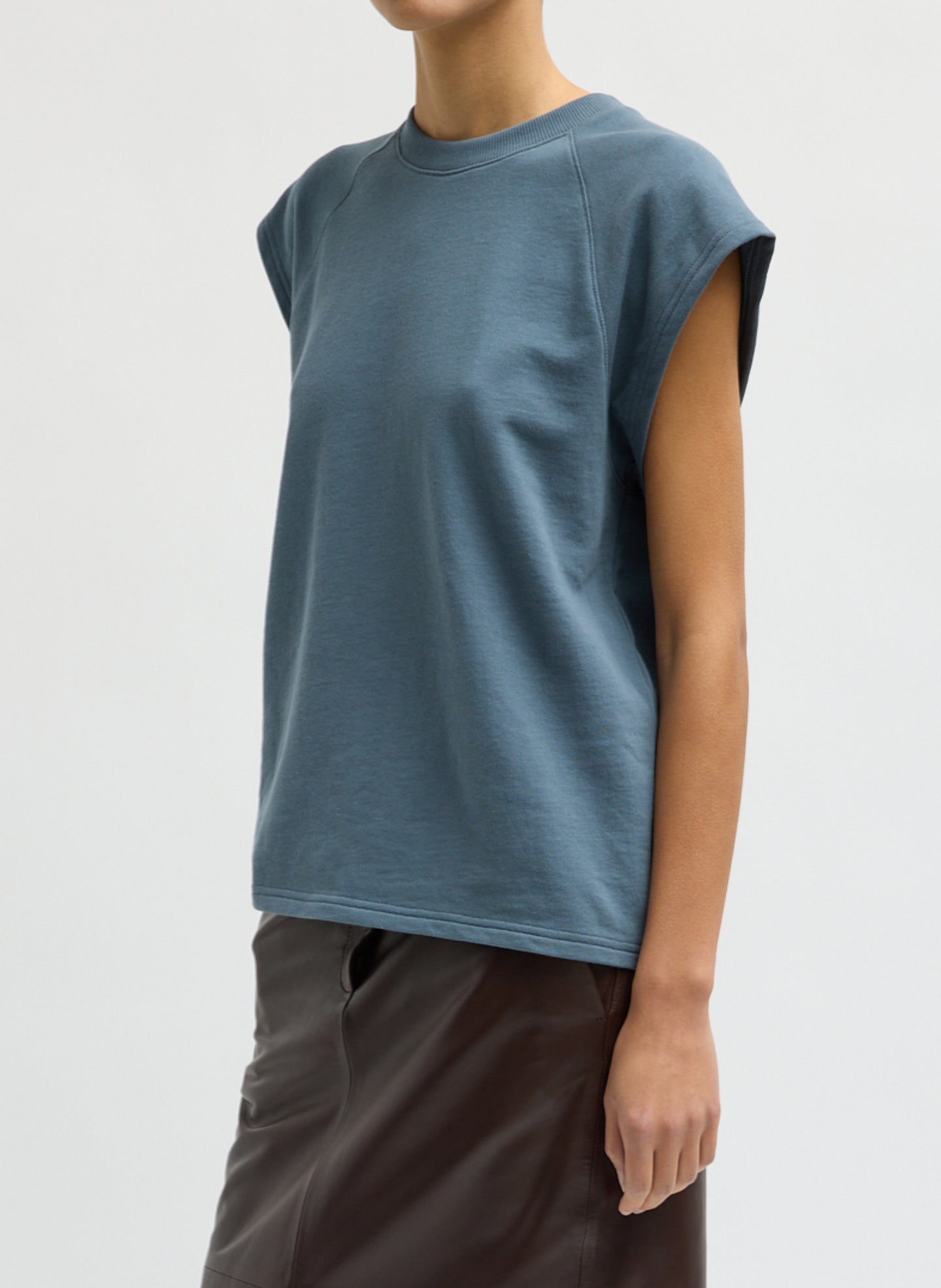 Blue Grey Light Weight Sweatshirting Sleeveless Easy Top - side view on model