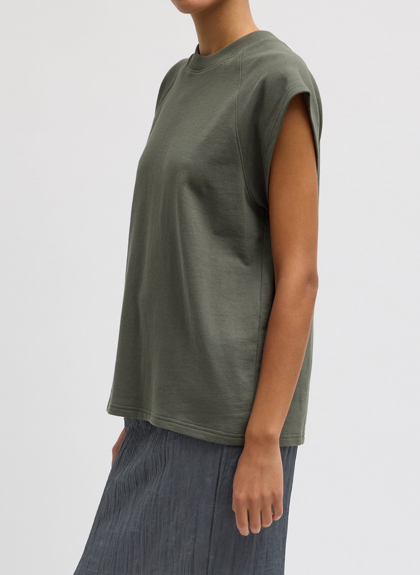 Olive Green Light Weight Sweatshirting Sleeveless Easy Top - side view on model