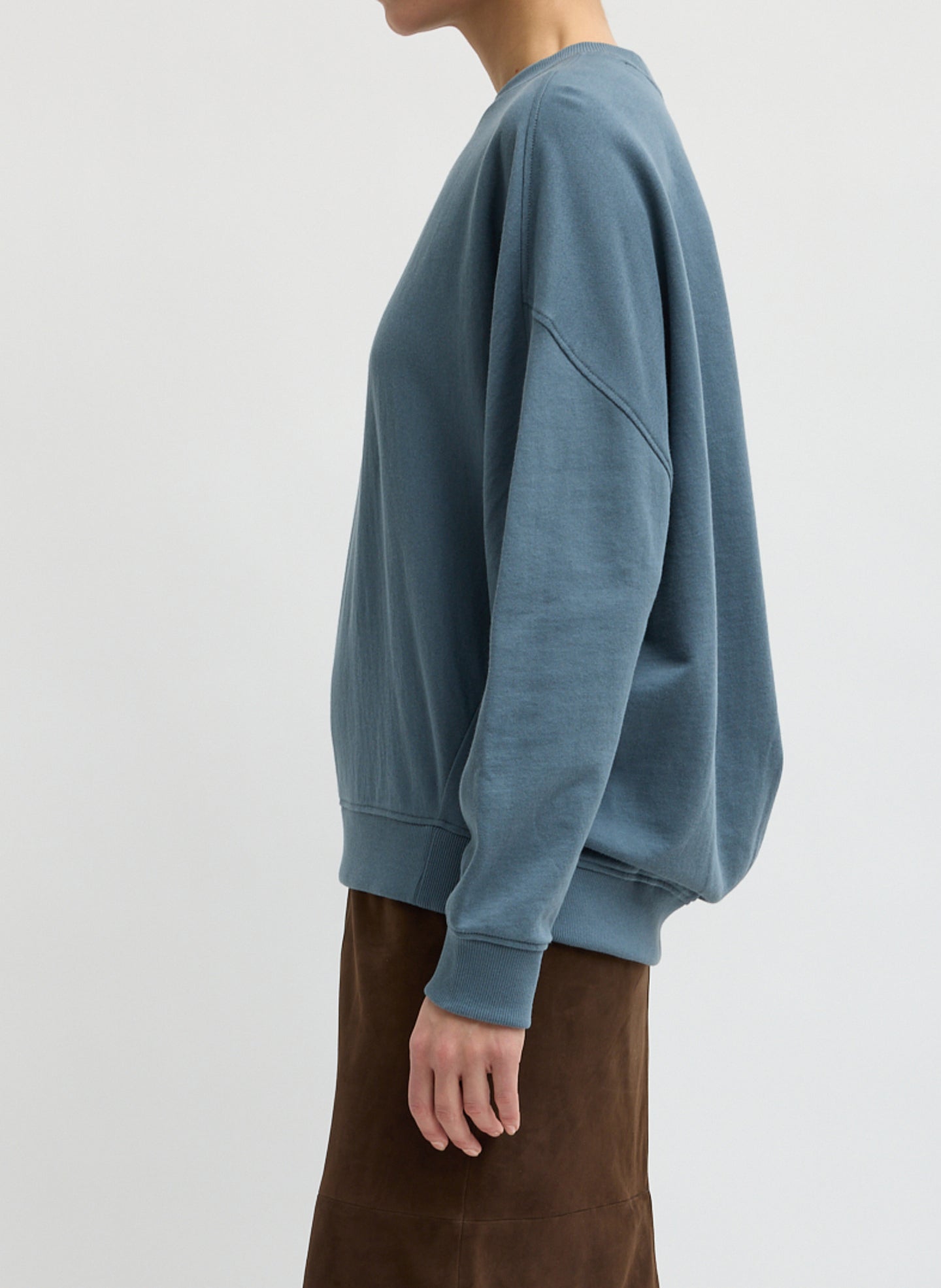 Blue Grey Light Weight Sweatshirting Crewneck Sweatshirt - side view on model