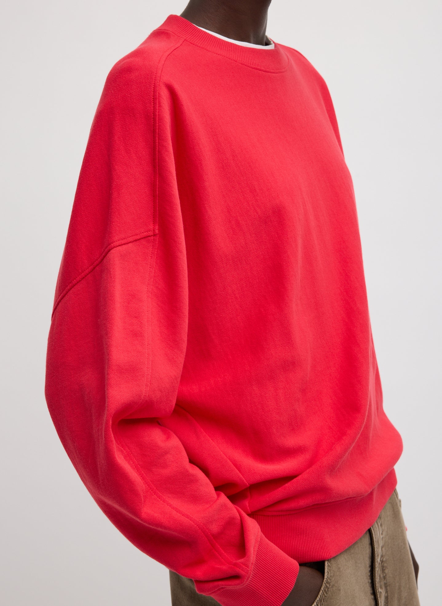 Red Light Weight Sweatshirting Crewneck Sweatshirt - side view on model