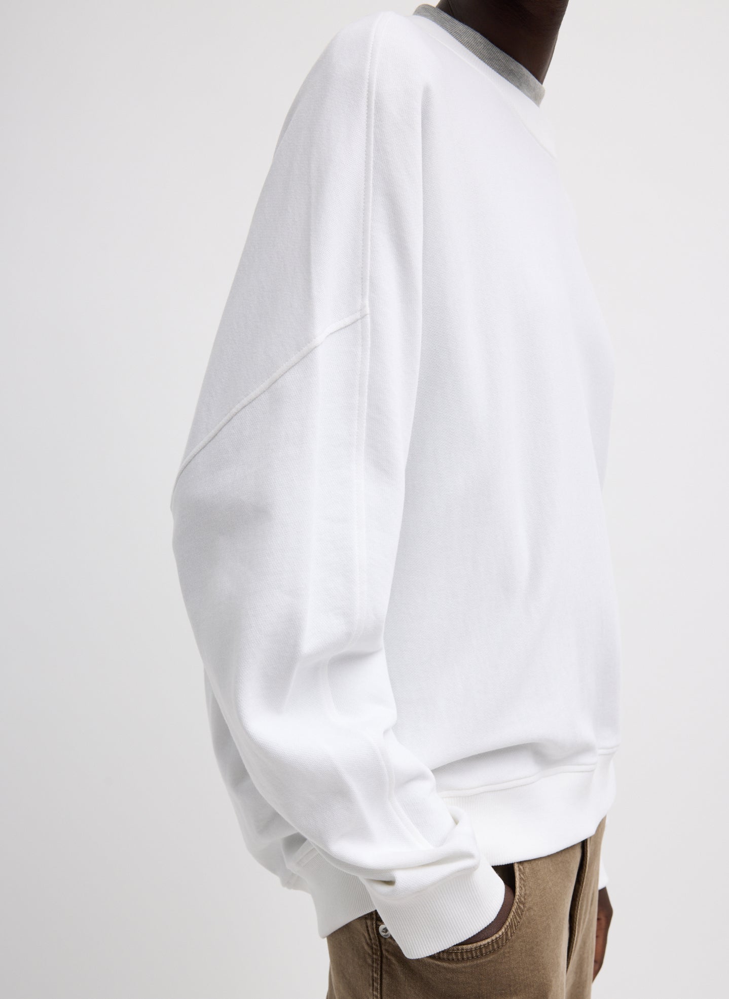 White Light Weight Sweatshirting Crewneck Sweatshirt - side view on model