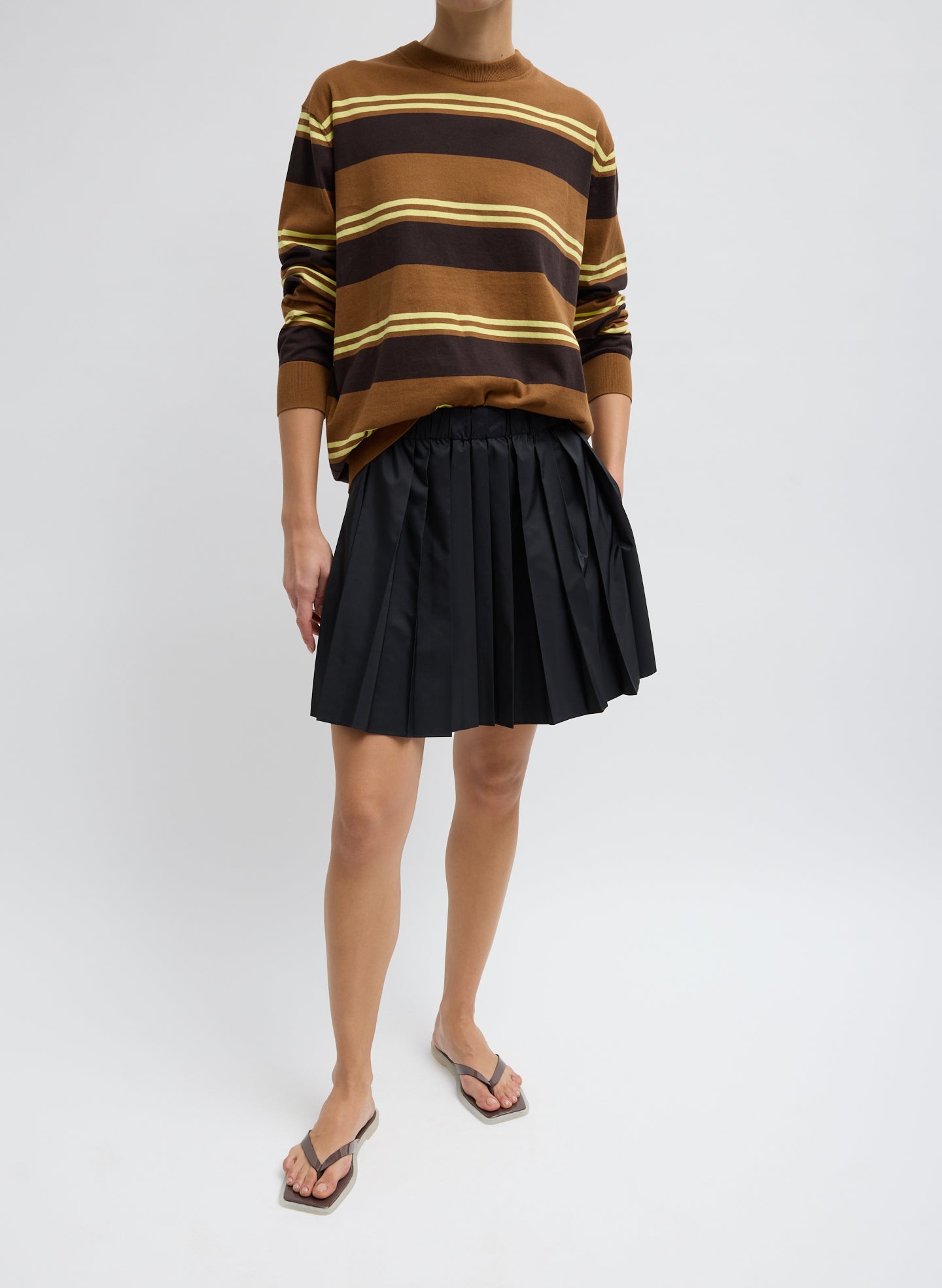 Summer Nylon Pull On Mini Skirt - Black Summer Nylon Pleated Mini Skirt - full look, front view on model