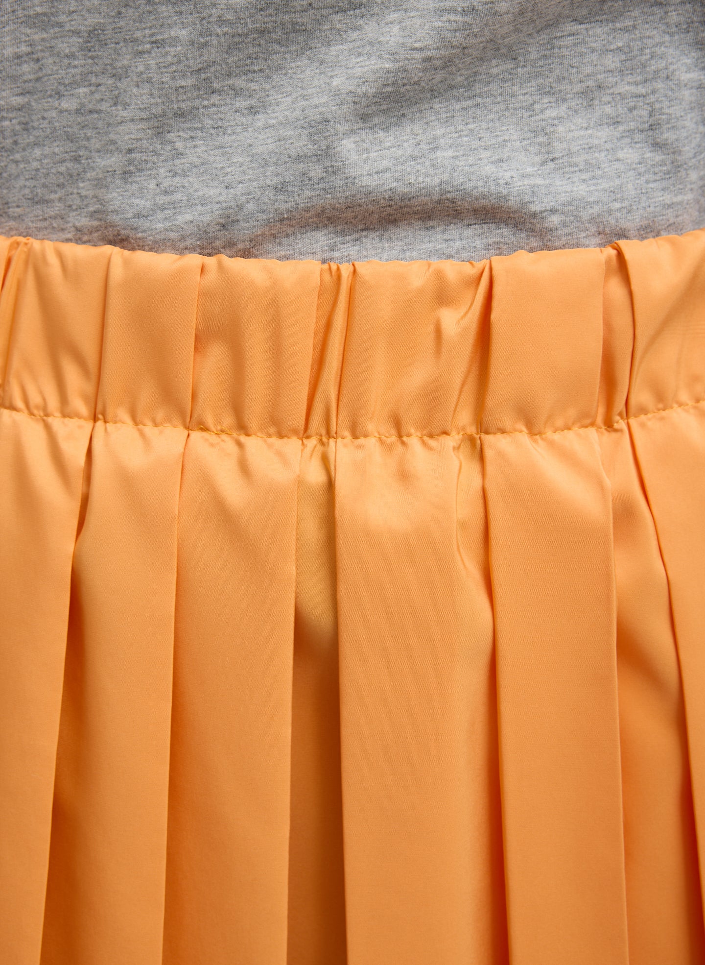 Orange Summer Nylon Pleated Mini Skirt - closeup of pleat details