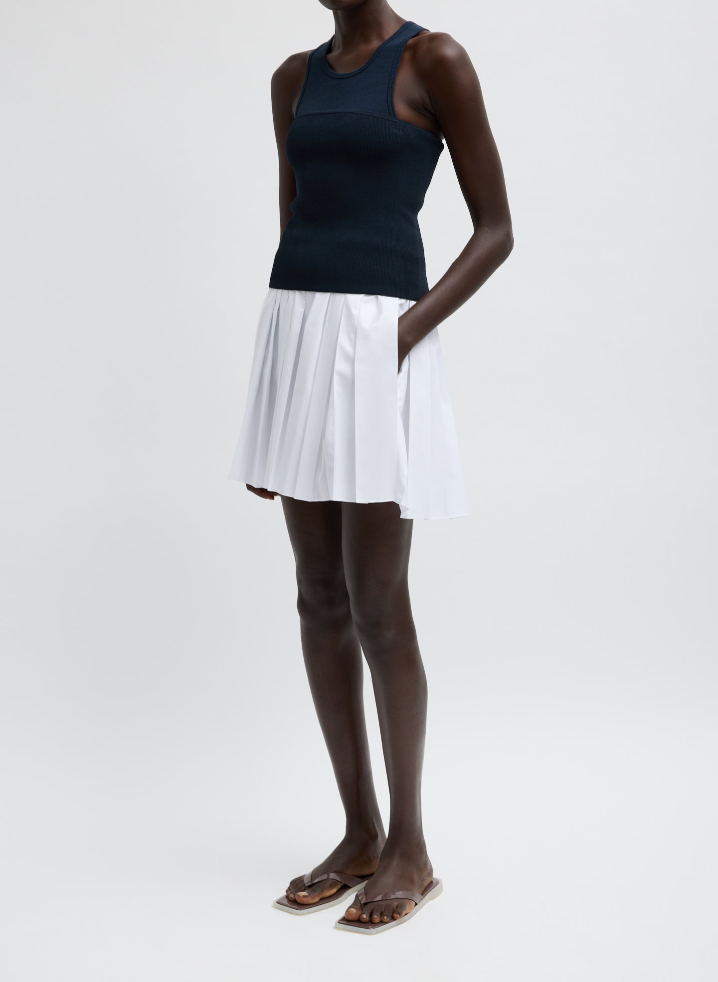 White Summer Nylon Pleated Mini Skirt - full look, side view on model