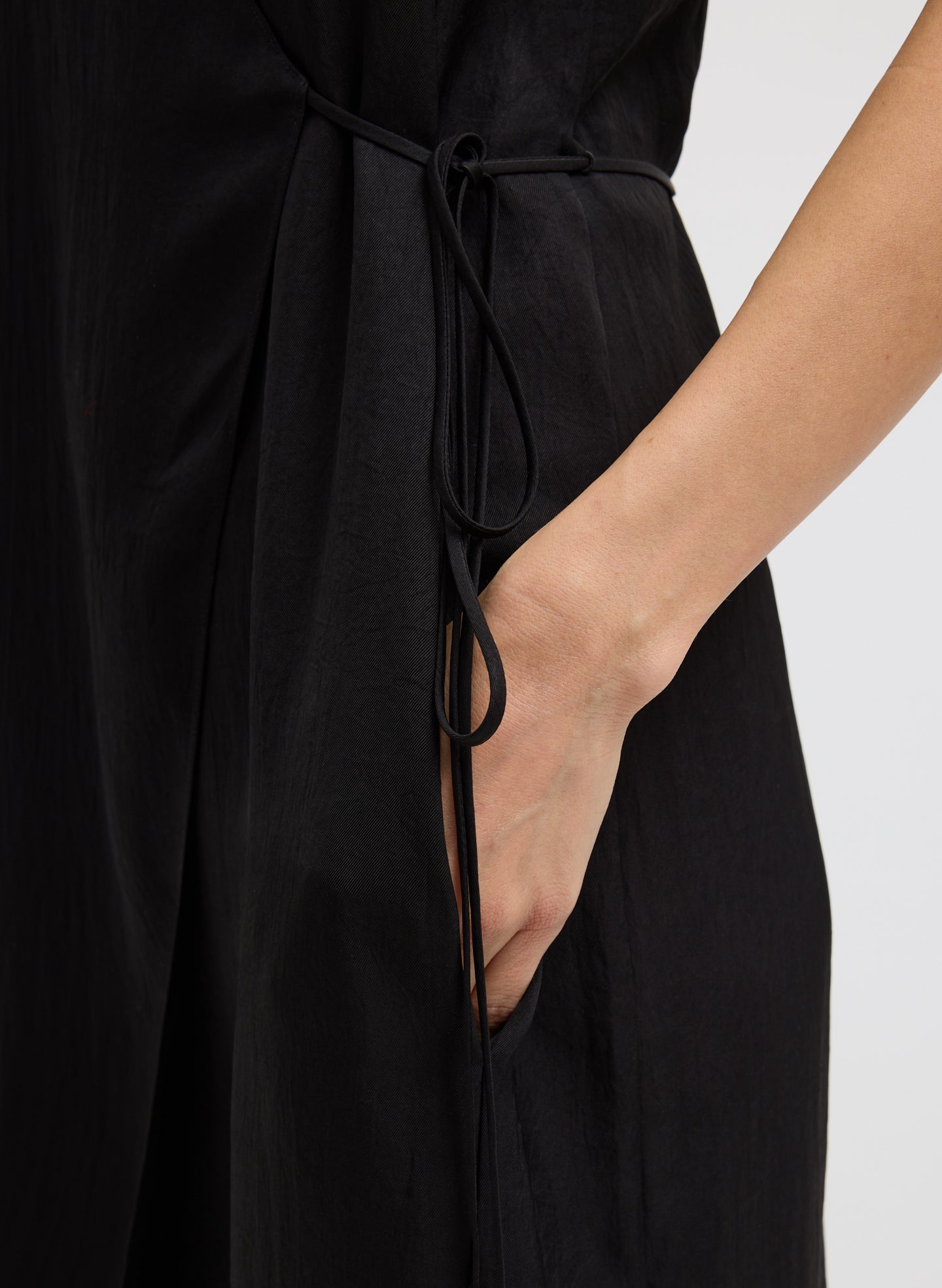 Black Summer Slip Wrap Dress - closeup of side pocket detail