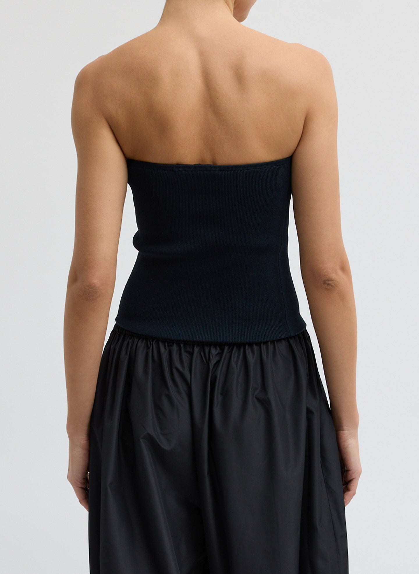 Navy Ribbed Sweater Tube Top - back view on model
