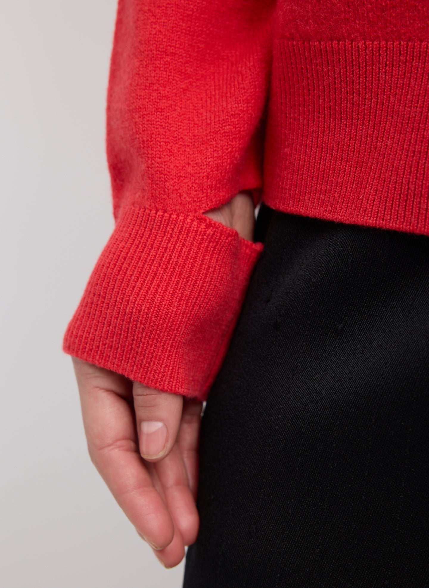Red Boiled Wool Crewneck Easy Pullover - closeup of cutout detail at wrist