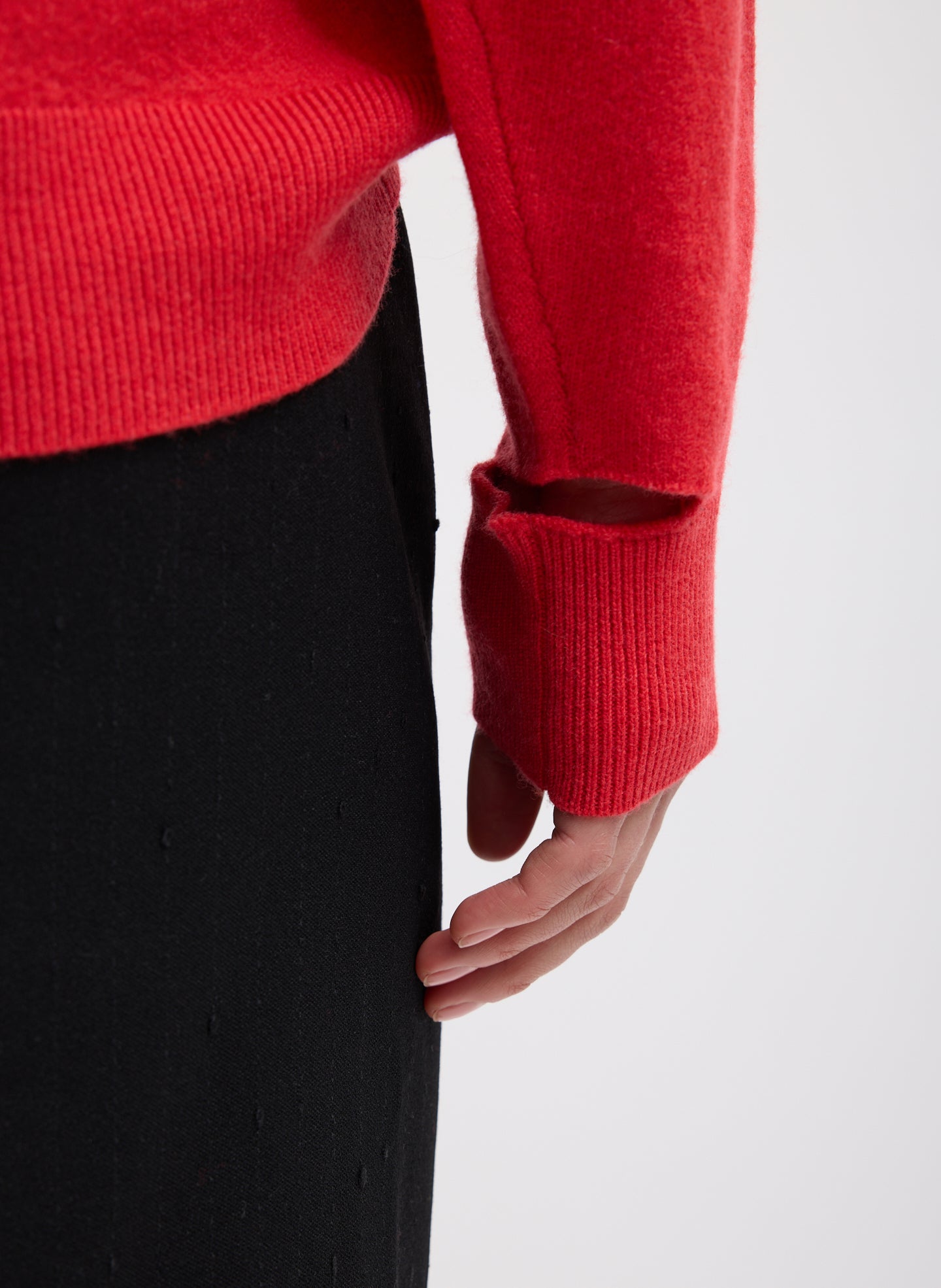 Red Boiled Wool Crewneck Easy Pullover - closeup of cutout detail at wrist
