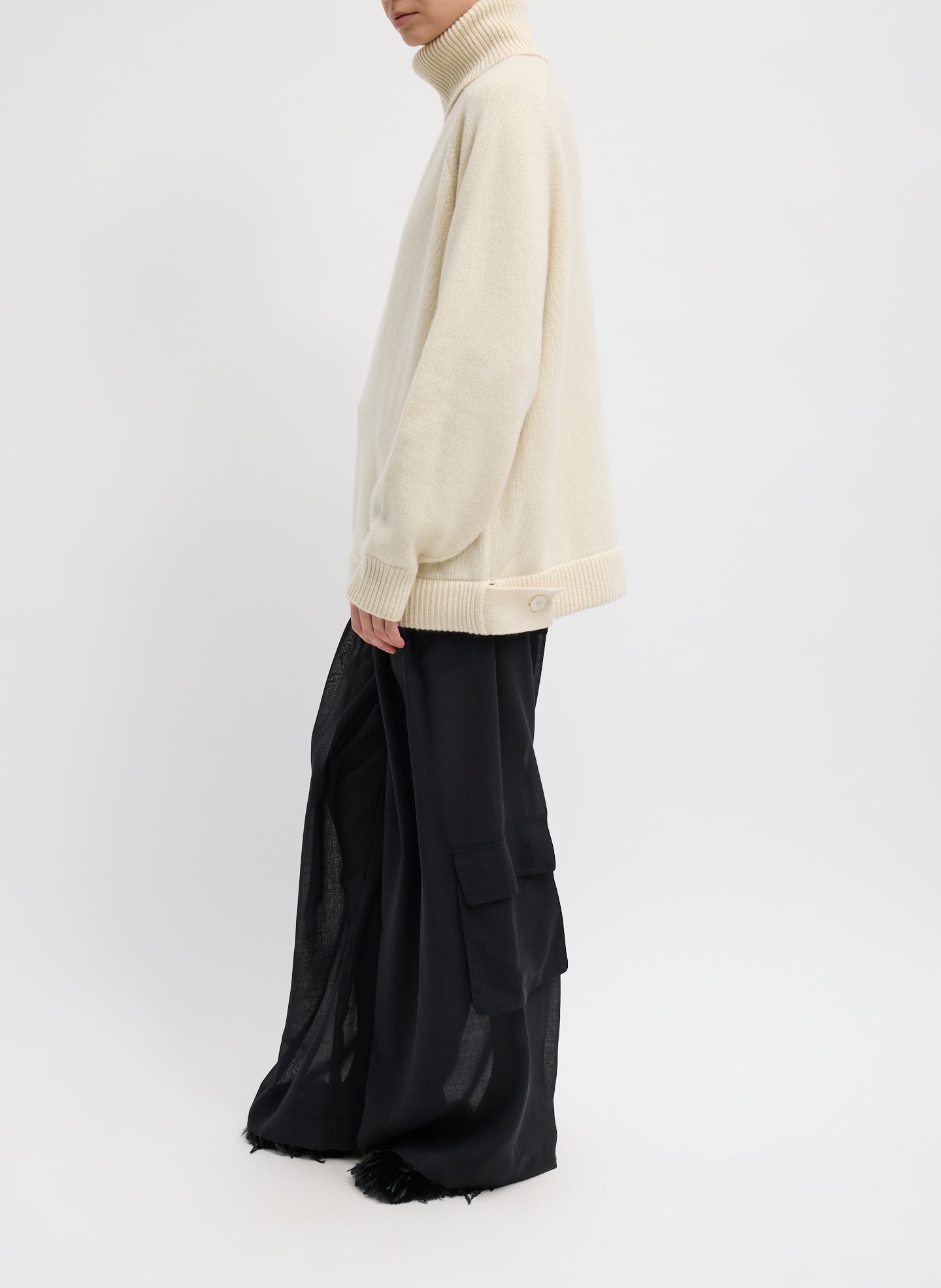 Ivory Cashmere Turtleneck Oversized Pullover Sweater - full look, side view on model