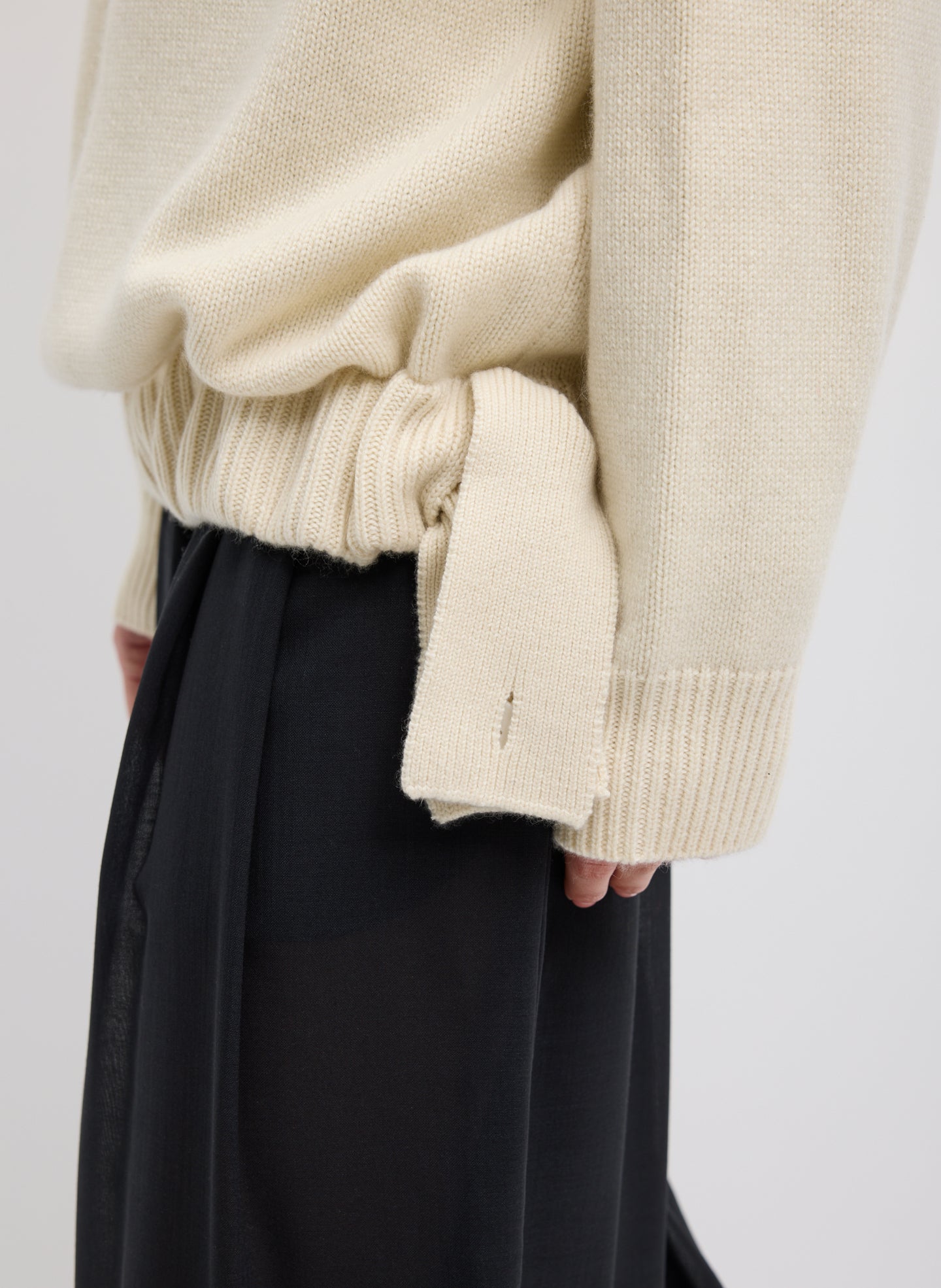 Ivory Cashmere Turtleneck Oversized Pullover Sweater - adjustable hem detail