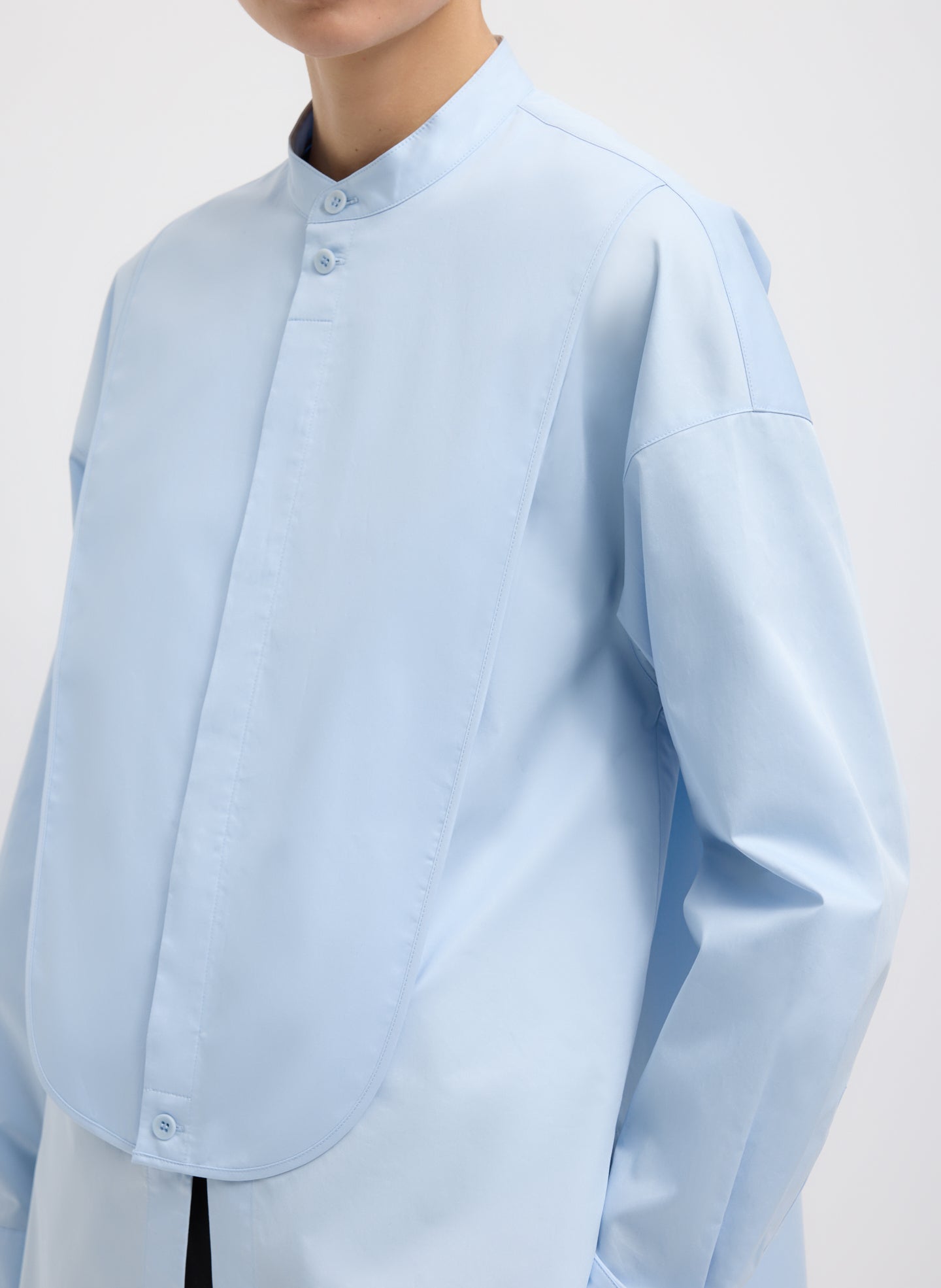 Chambray Blue Eco Poplin Tuxedo Shirt With Bib Flap - closeup of bib flap