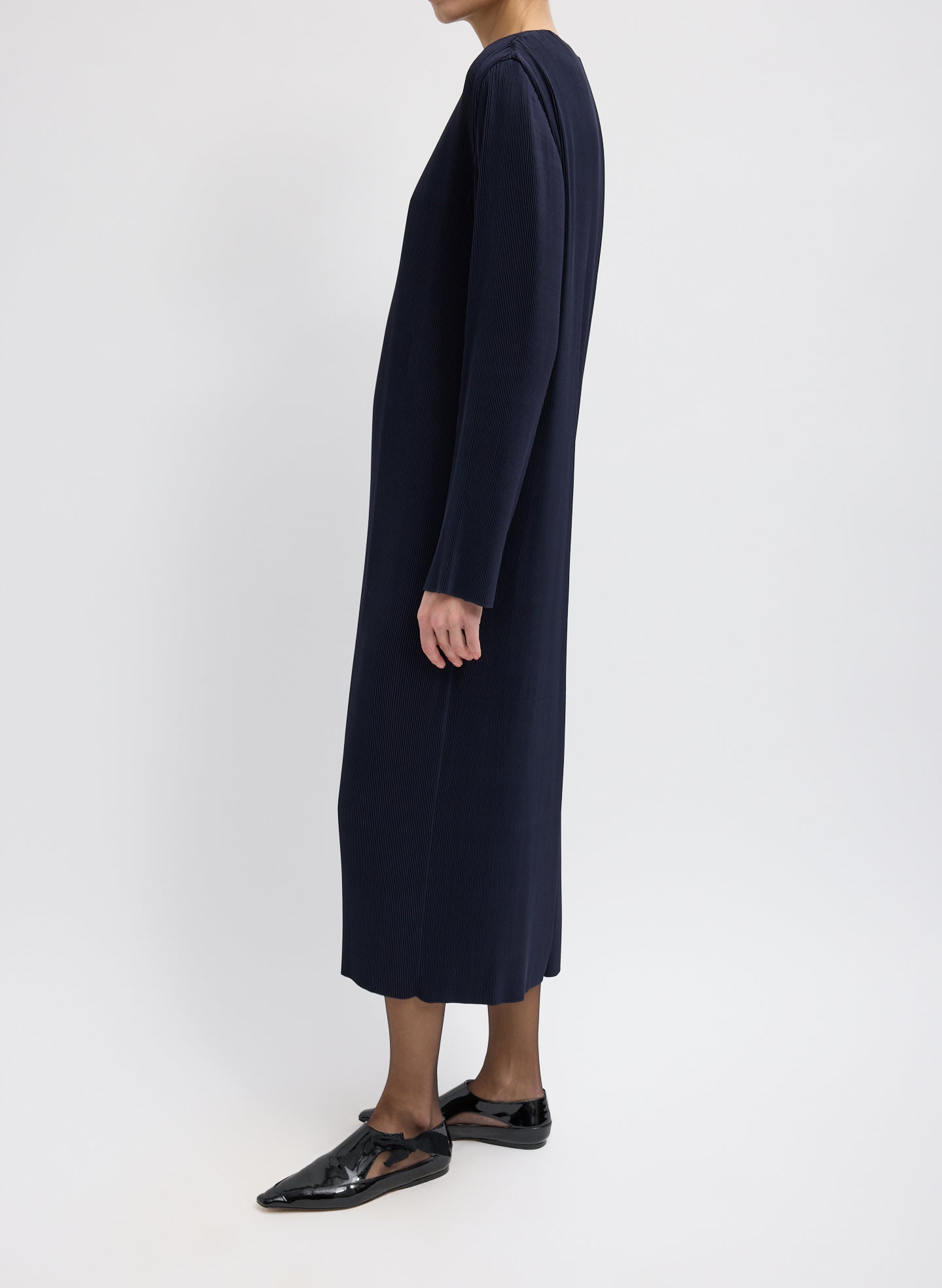 Dark Navy Plisse Midi Dress - long sleeve, side view on model