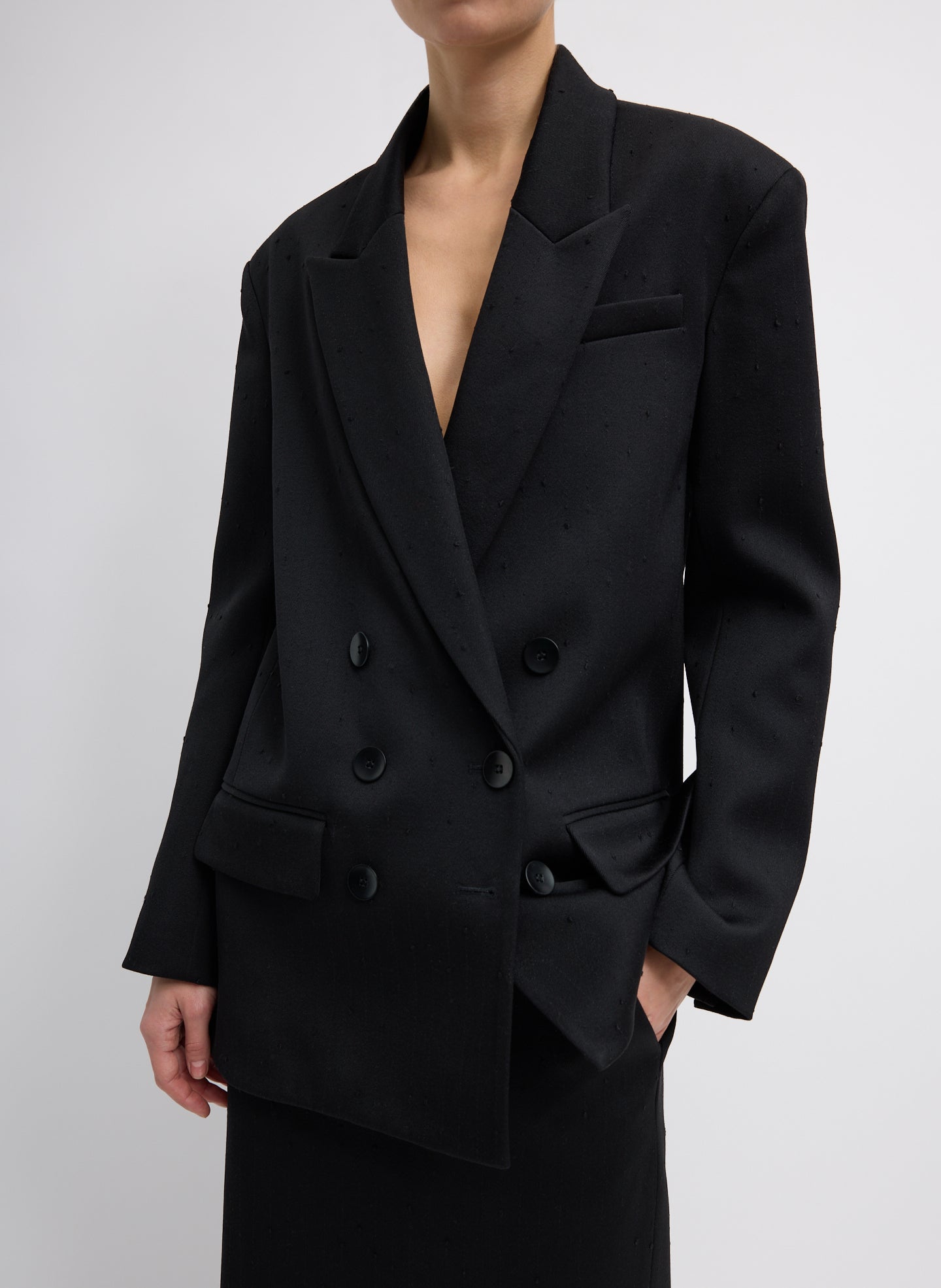 Refined Wool Slub Blazer With Cut Out Organza Back - Black Refined Wool Slub Blazer With Cut Out Organza Back - double-breasted, front view on model