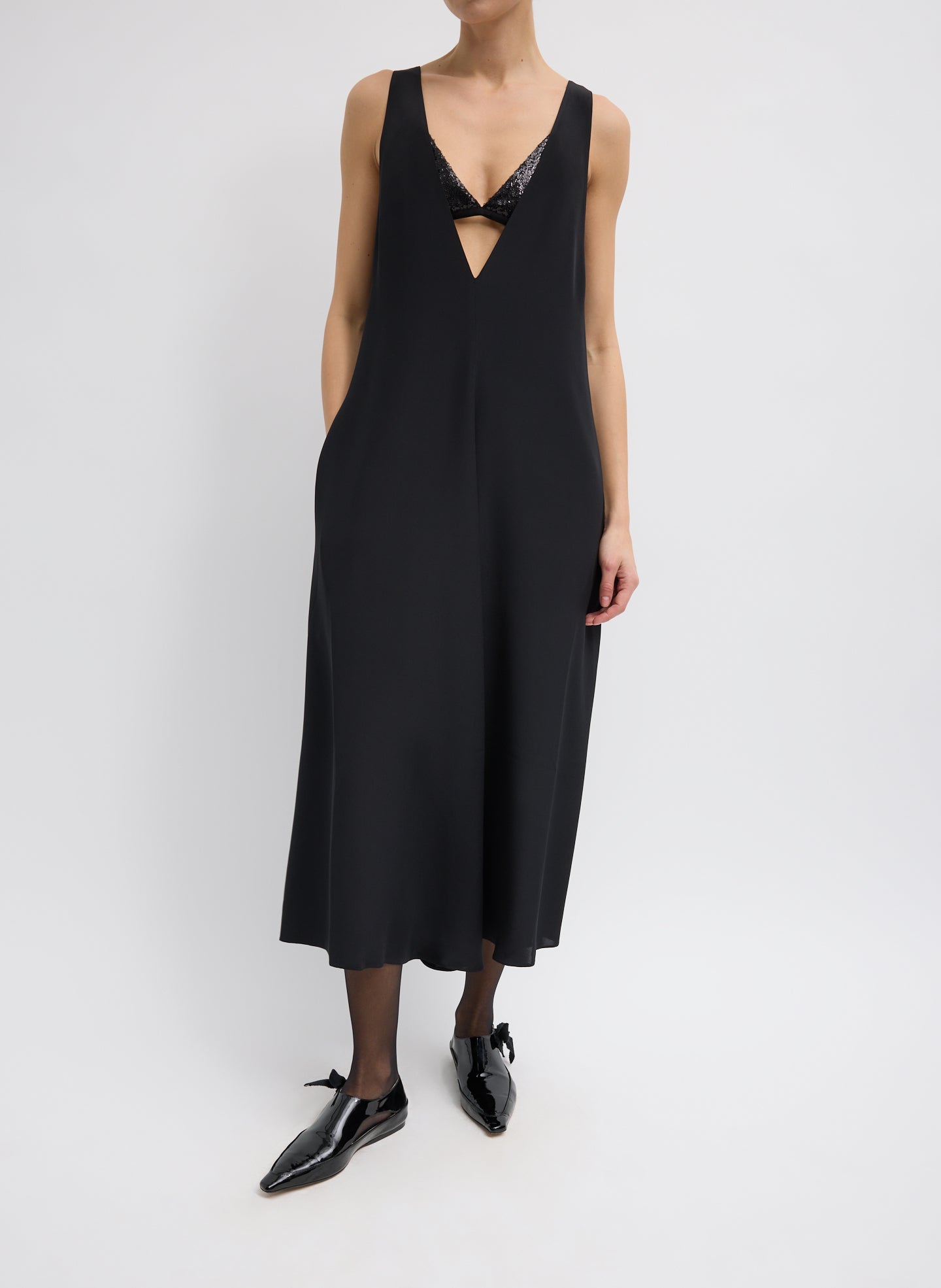 Black 4-Ply Silk V-Neck Dress With Bra - low cut v-neck, front view on model
