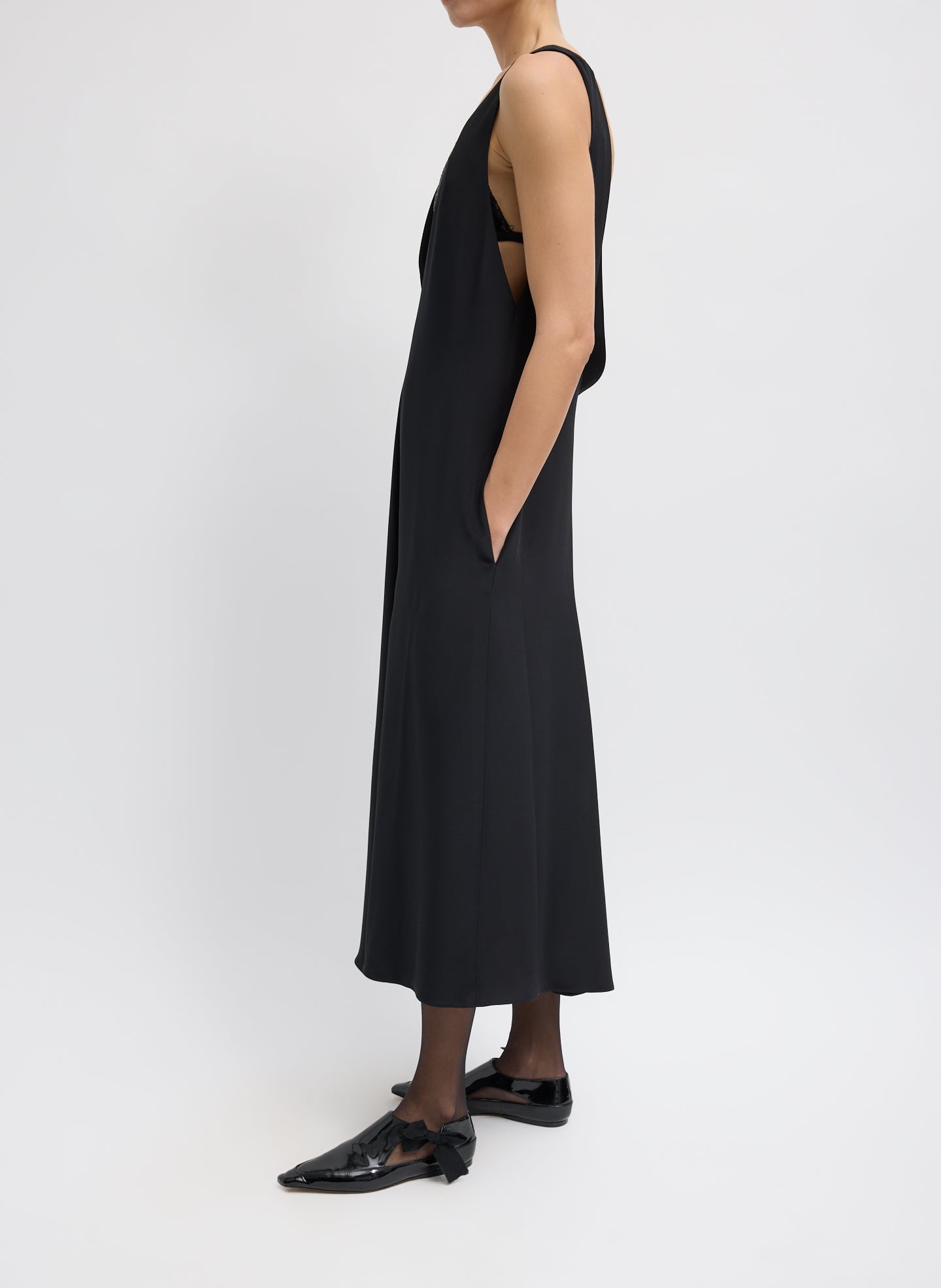 Black 4-Ply Silk V-Neck Dress With Bra - low cut v-neck, side view on model