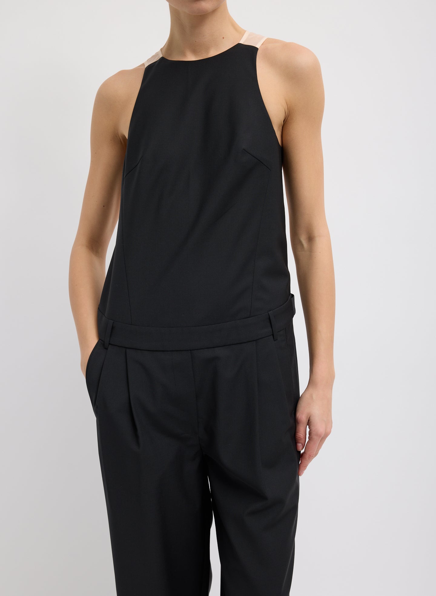 Black Recycled Tropical Wool Jumpsuit - closeup of front view on model