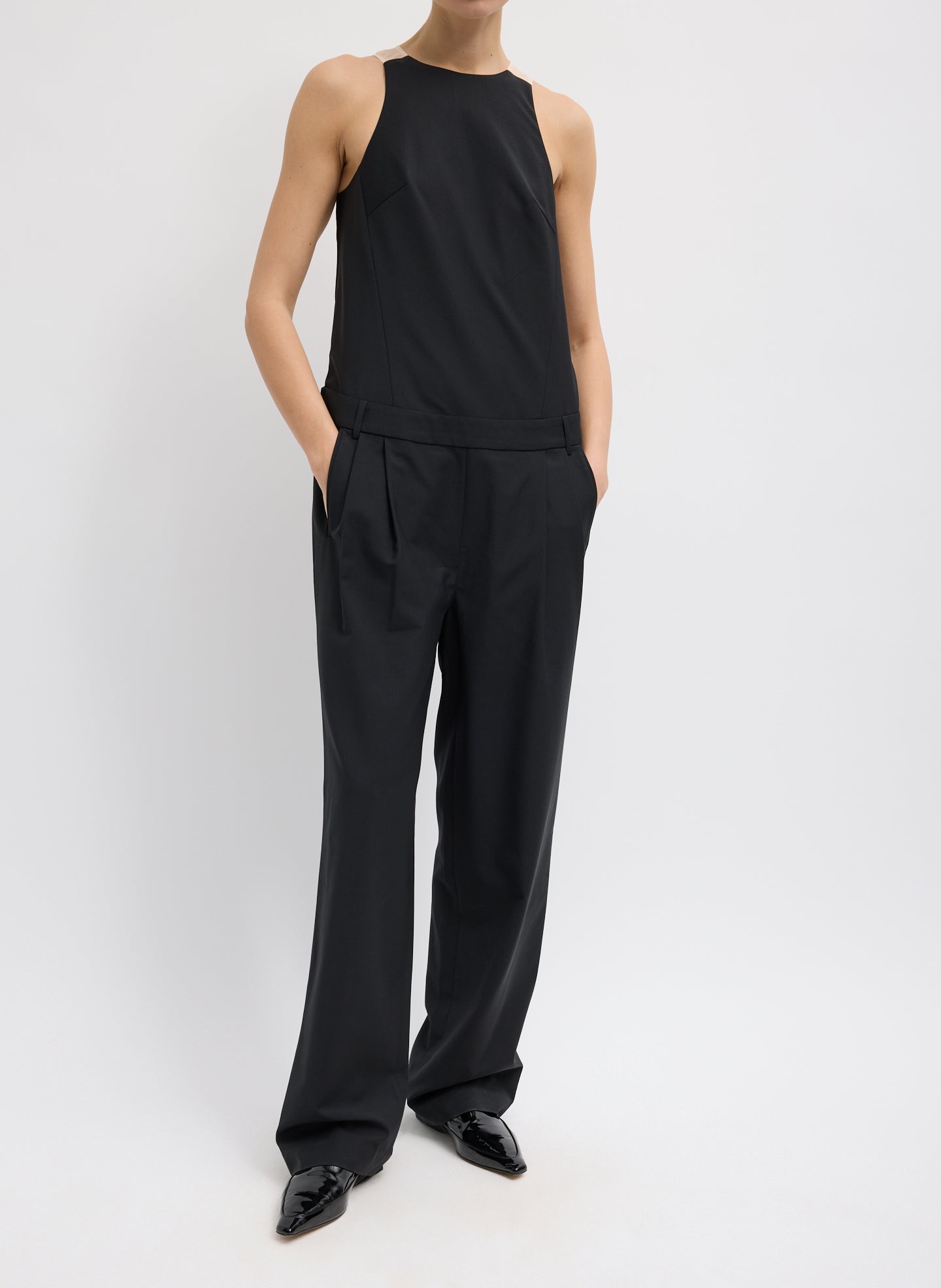 Black Recycled Tropical Wool Jumpsuit - sheer organza back, front view on model