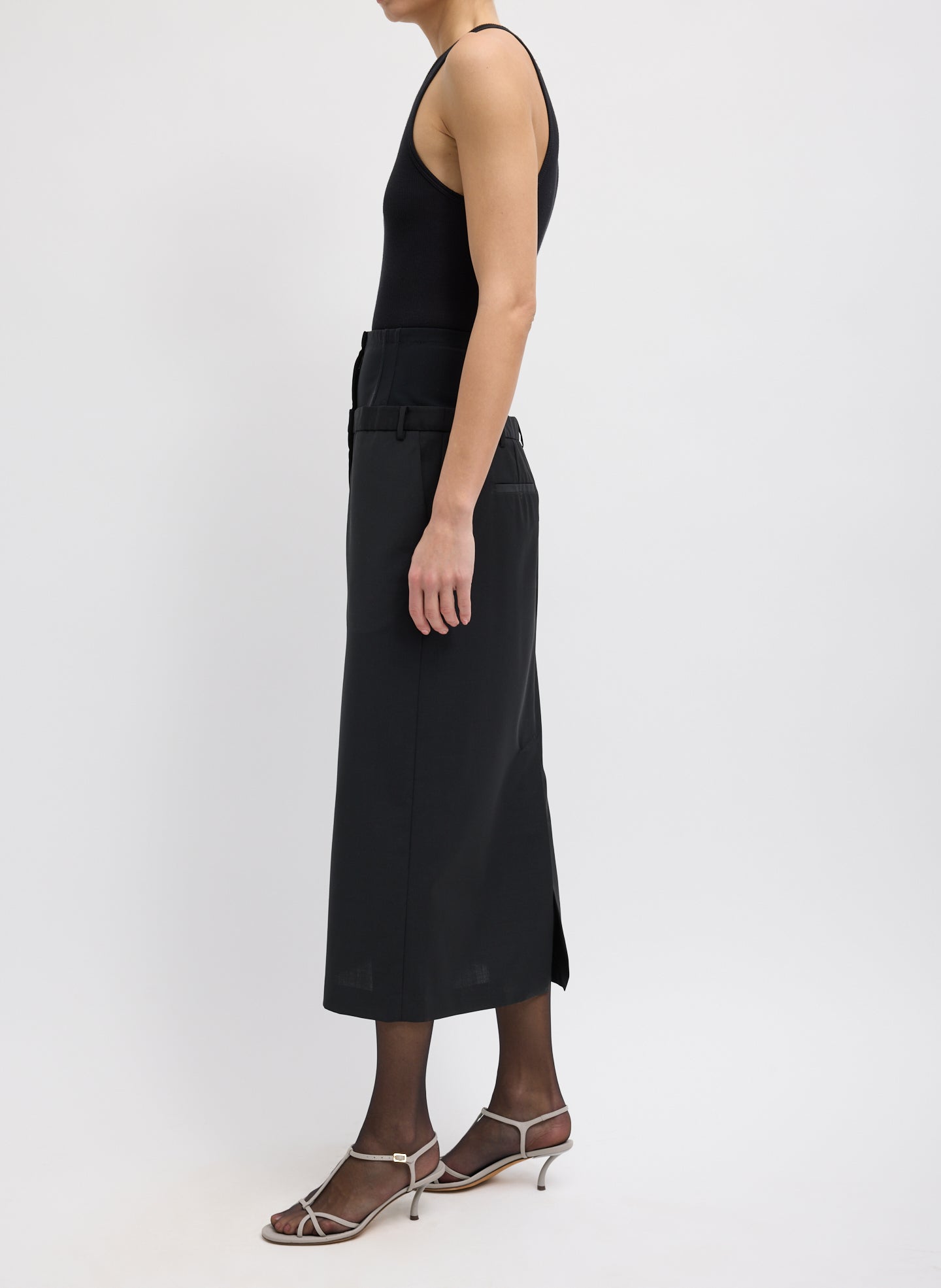 Black Recycled Tropical Wool Corset Maxi Trouser Skirt - double waisted, side view on model