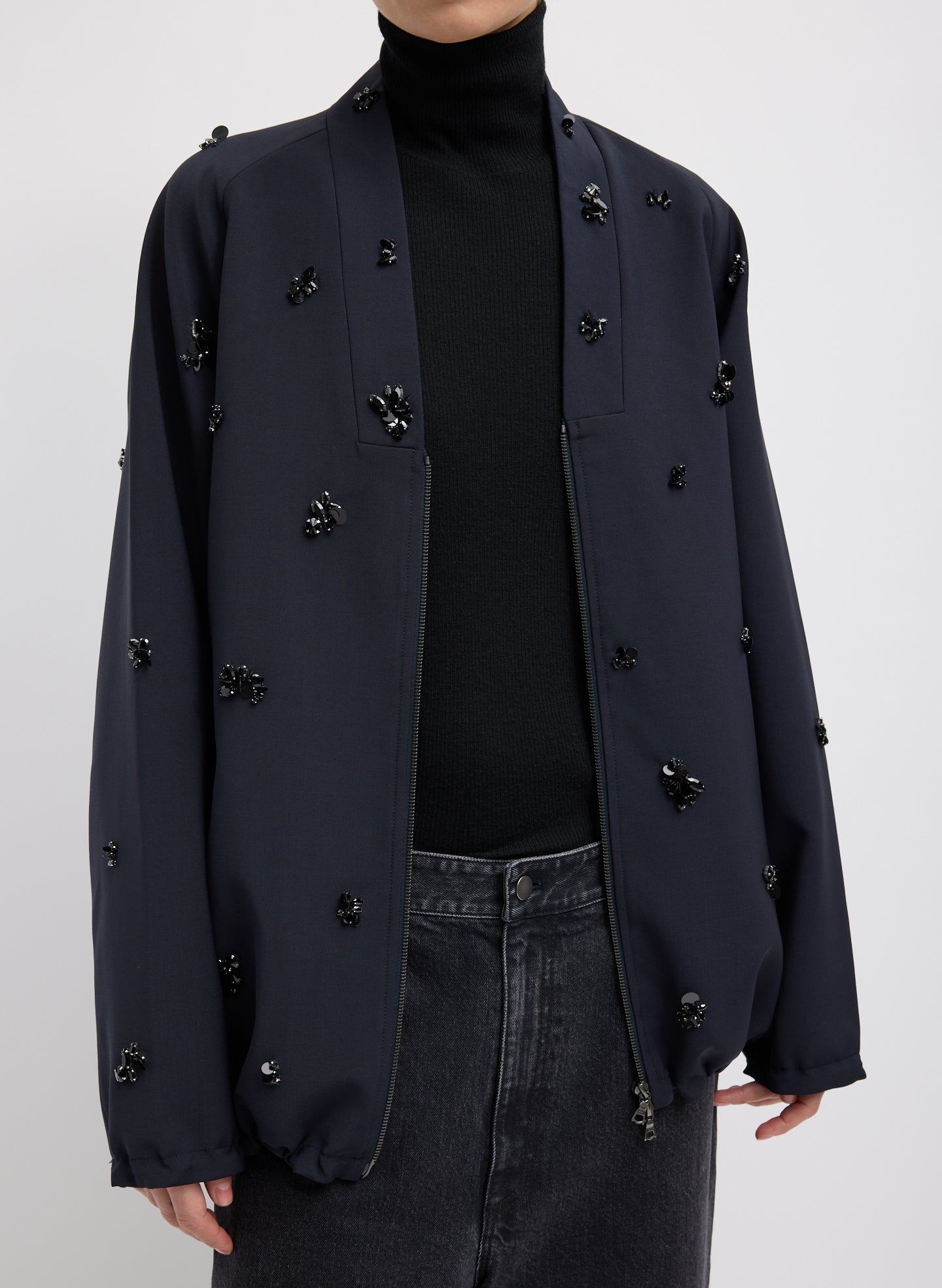 Black Tropical Wool Beaded Bomber Jacket - unzipped, front view on model