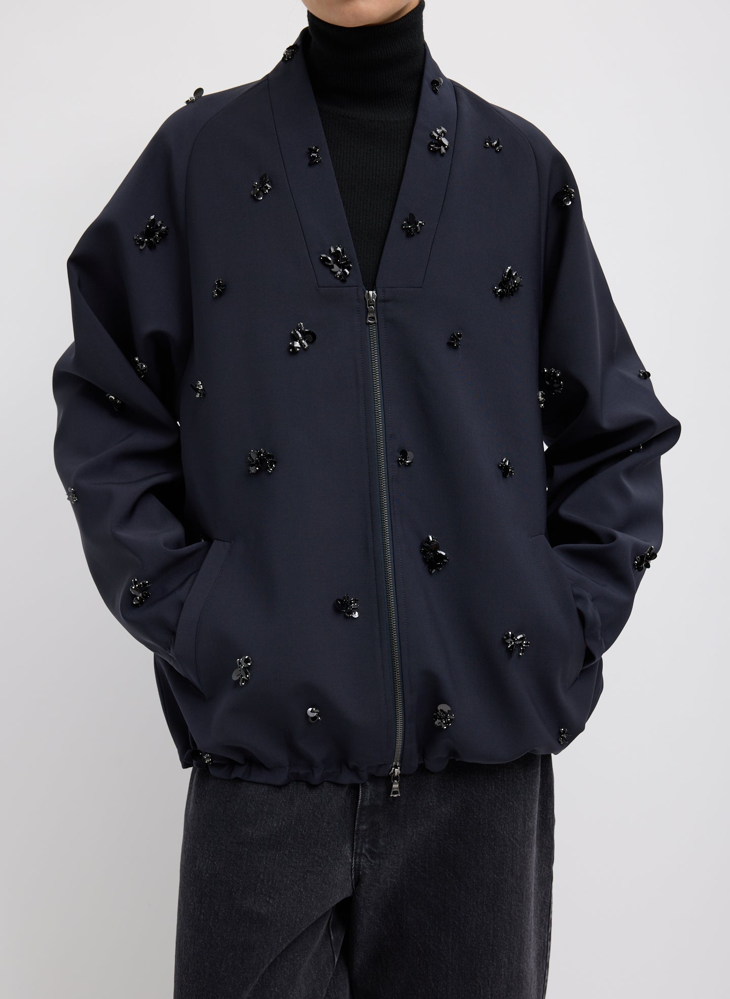 Black Tropical Wool Beaded Bomber Jacket - embellished, front view on model