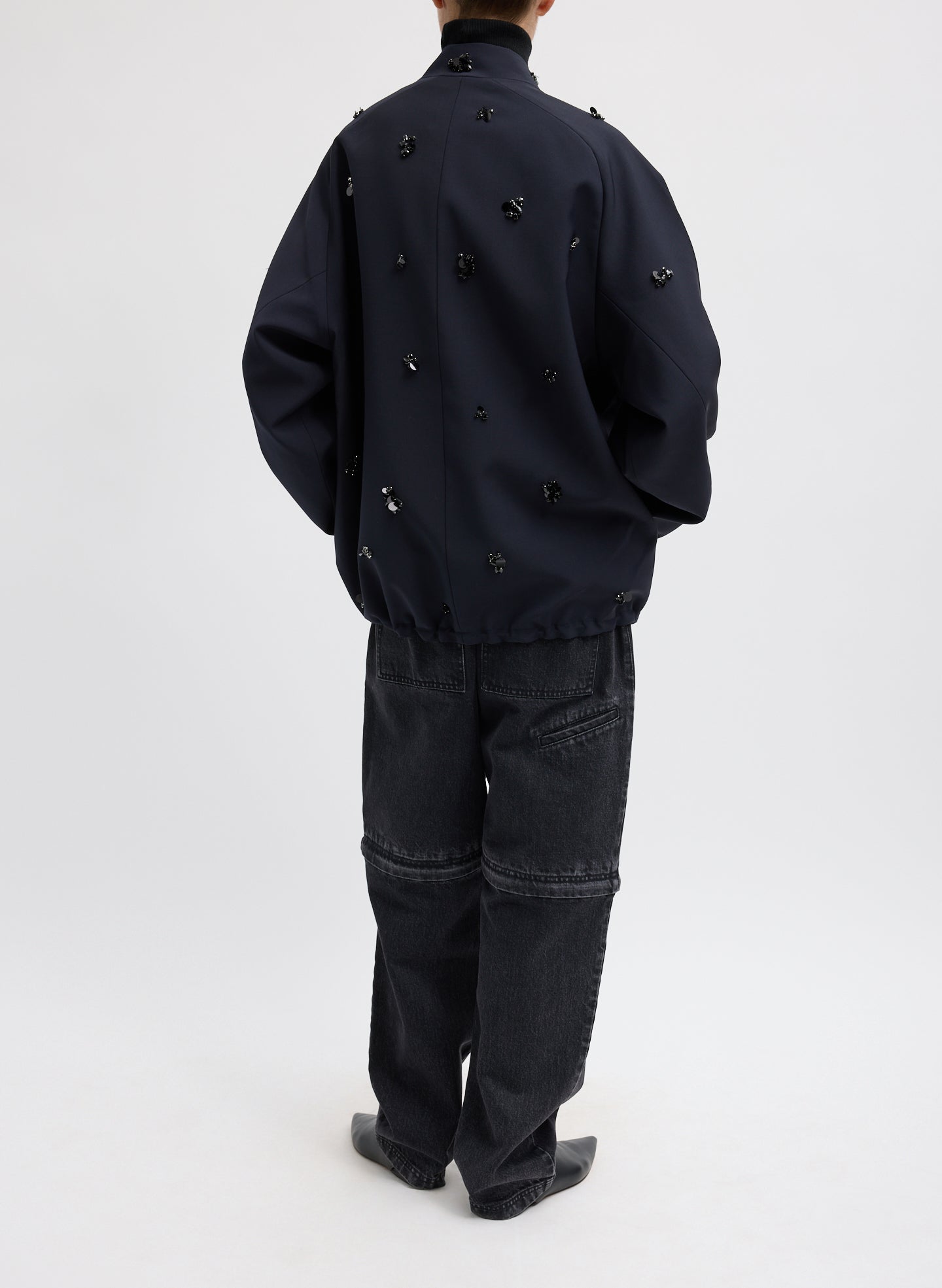 Black Tropical Wool Beaded Bomber Jacket - full look, back view on model