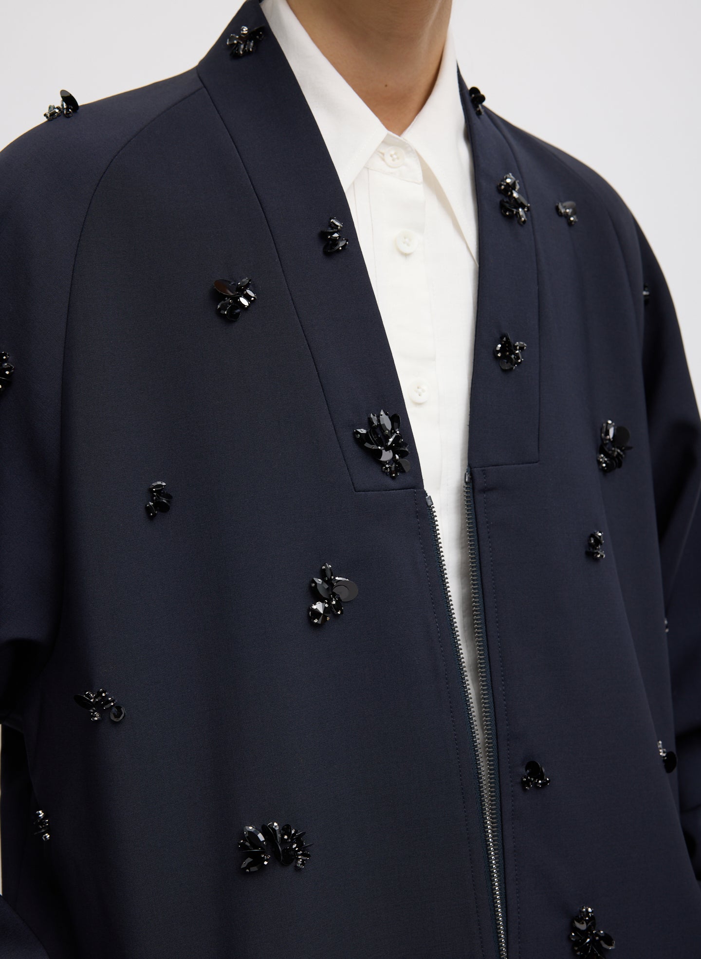 Black Tropical Wool Beaded Bomber Jacket - closeup on beaded embellishments