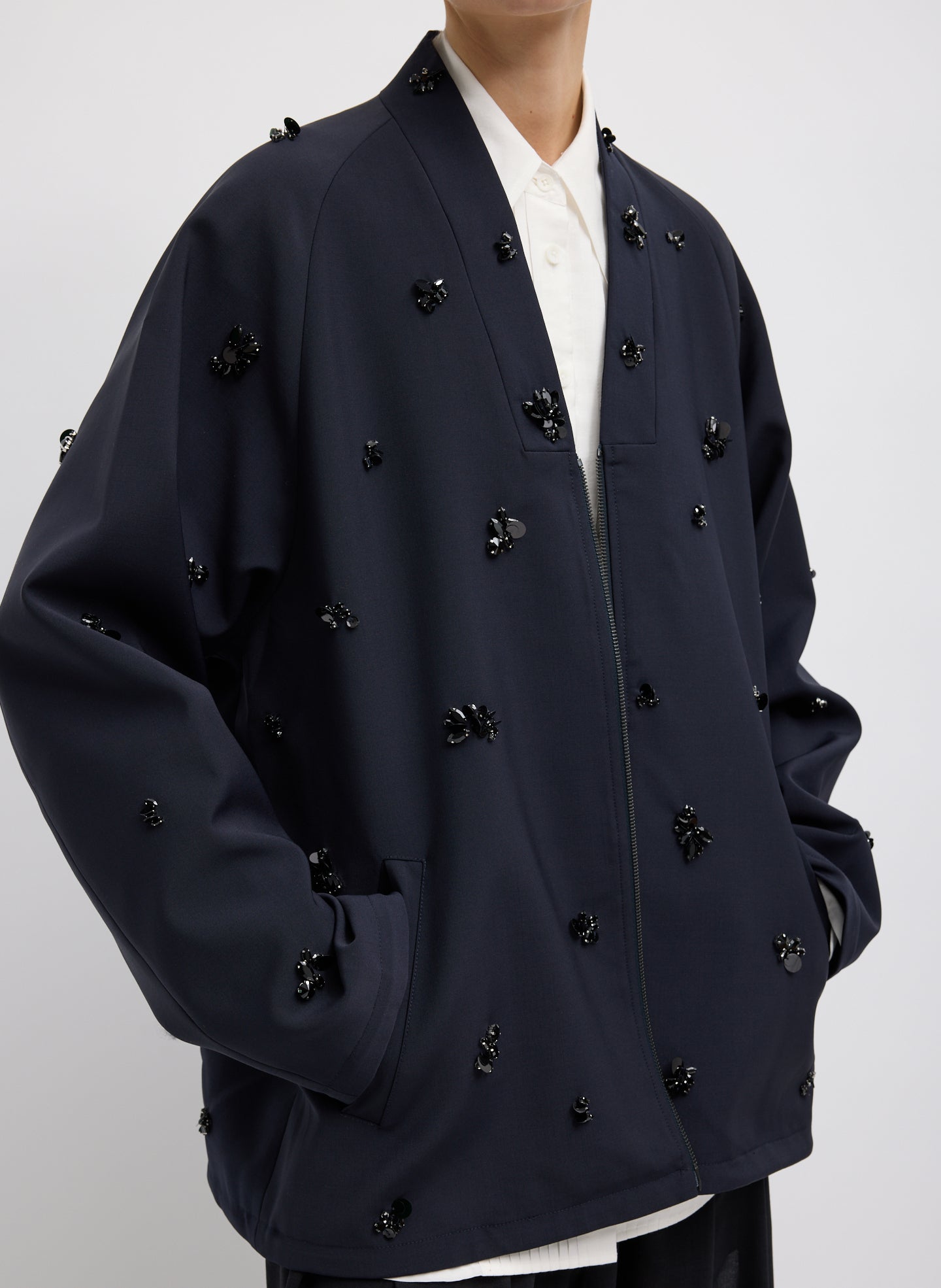 Tropical Wool Beaded Bomber Jacket - Black Tropical Wool Beaded Bomber Jacket - embellished, front view on model
