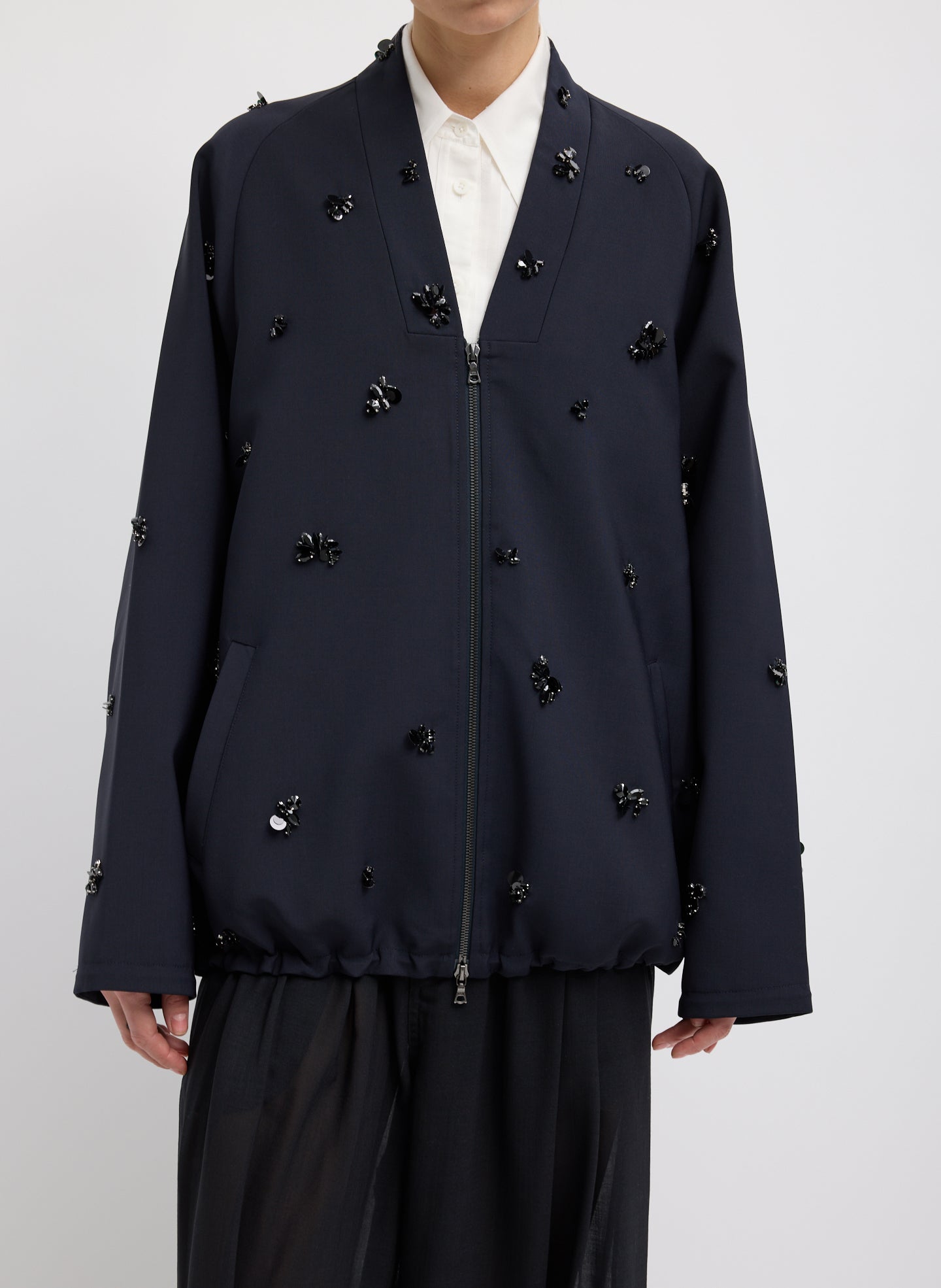 Black Tropical Wool Beaded Bomber Jacket - embellished, front view on model
