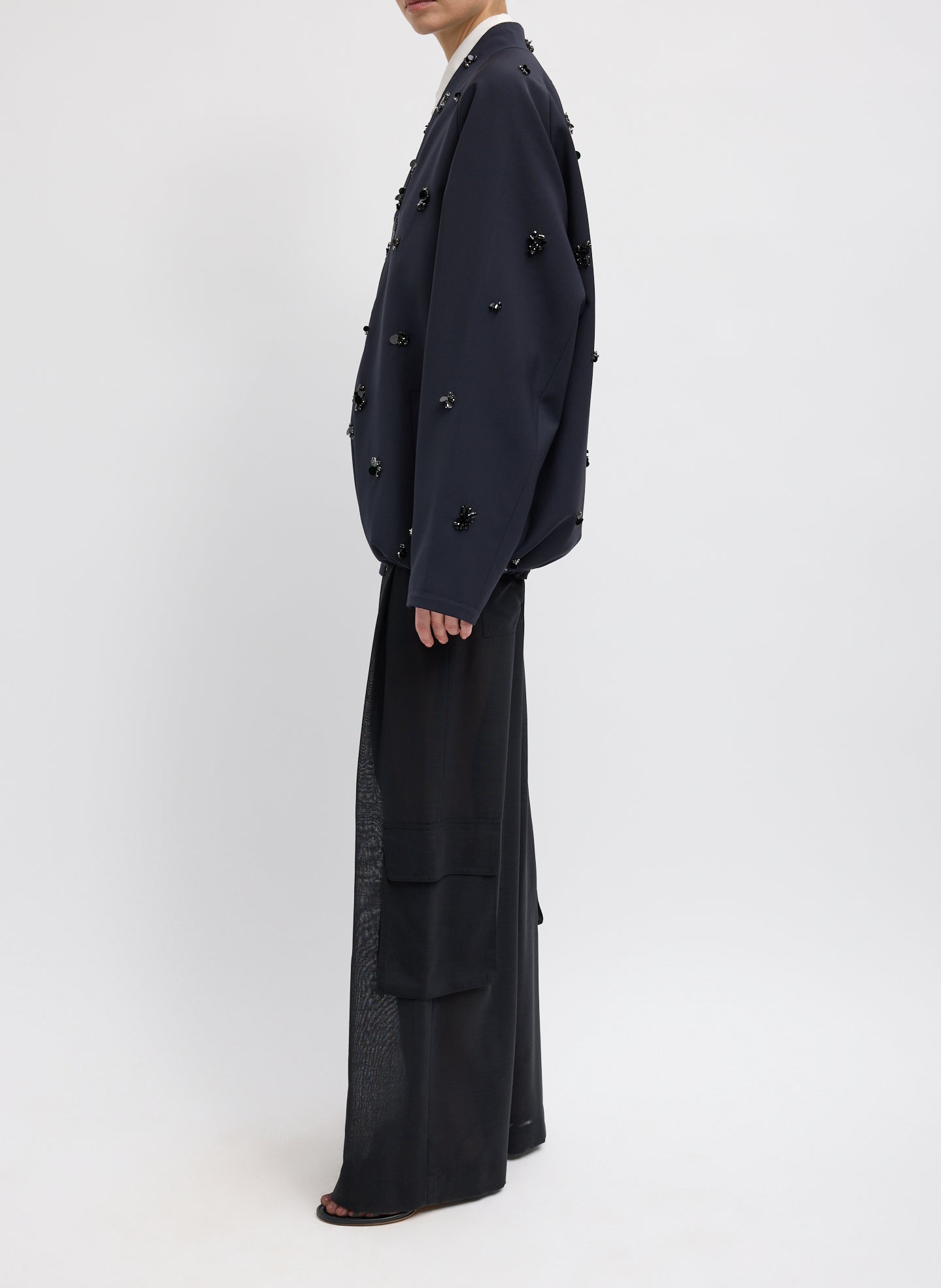 Black Tropical Wool Beaded Bomber Jacket - full look, side view on model