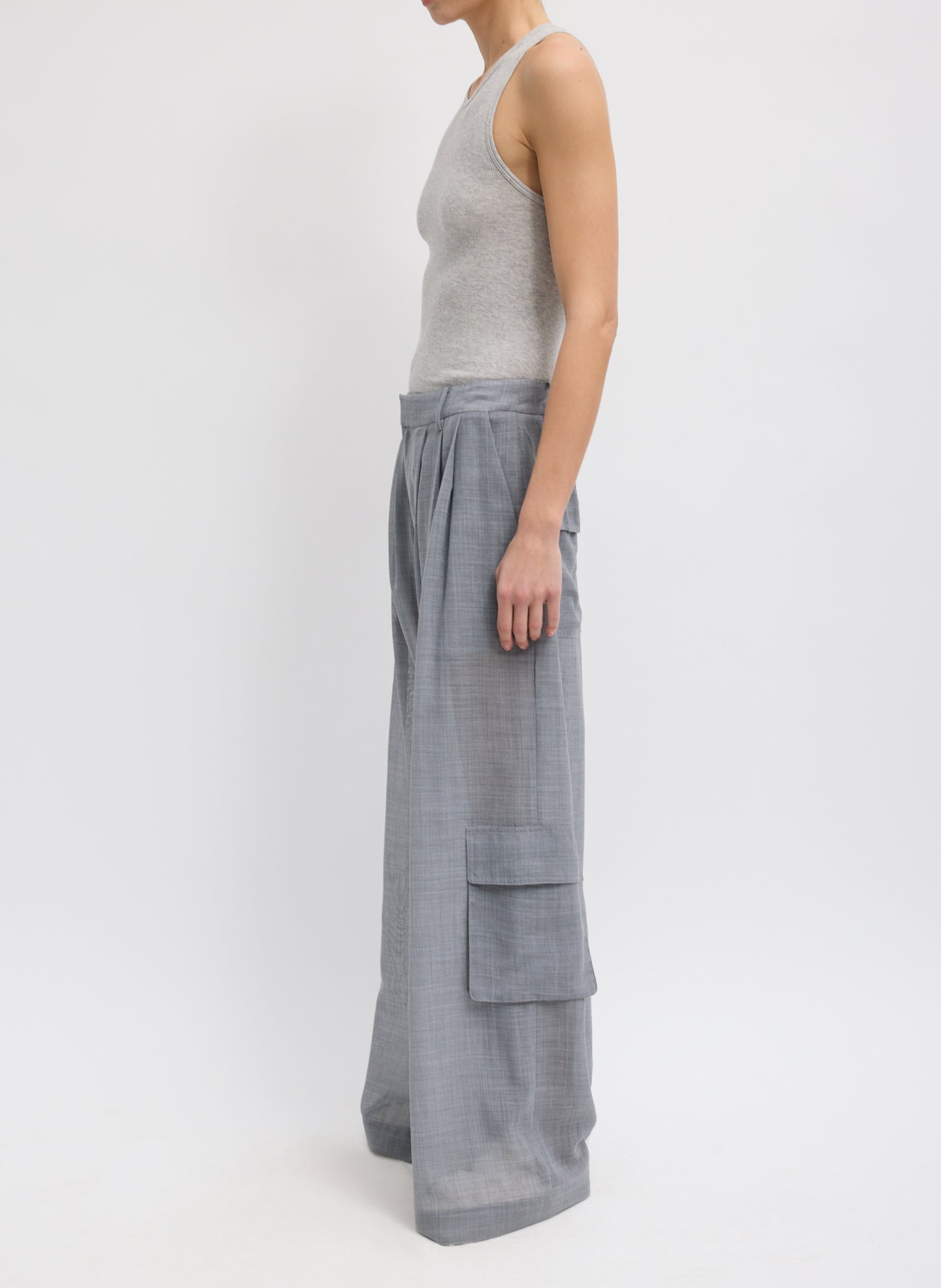 Heather Grey Sheer Wool Gauze Triple Pleat Pant –  sheer, side view on model 