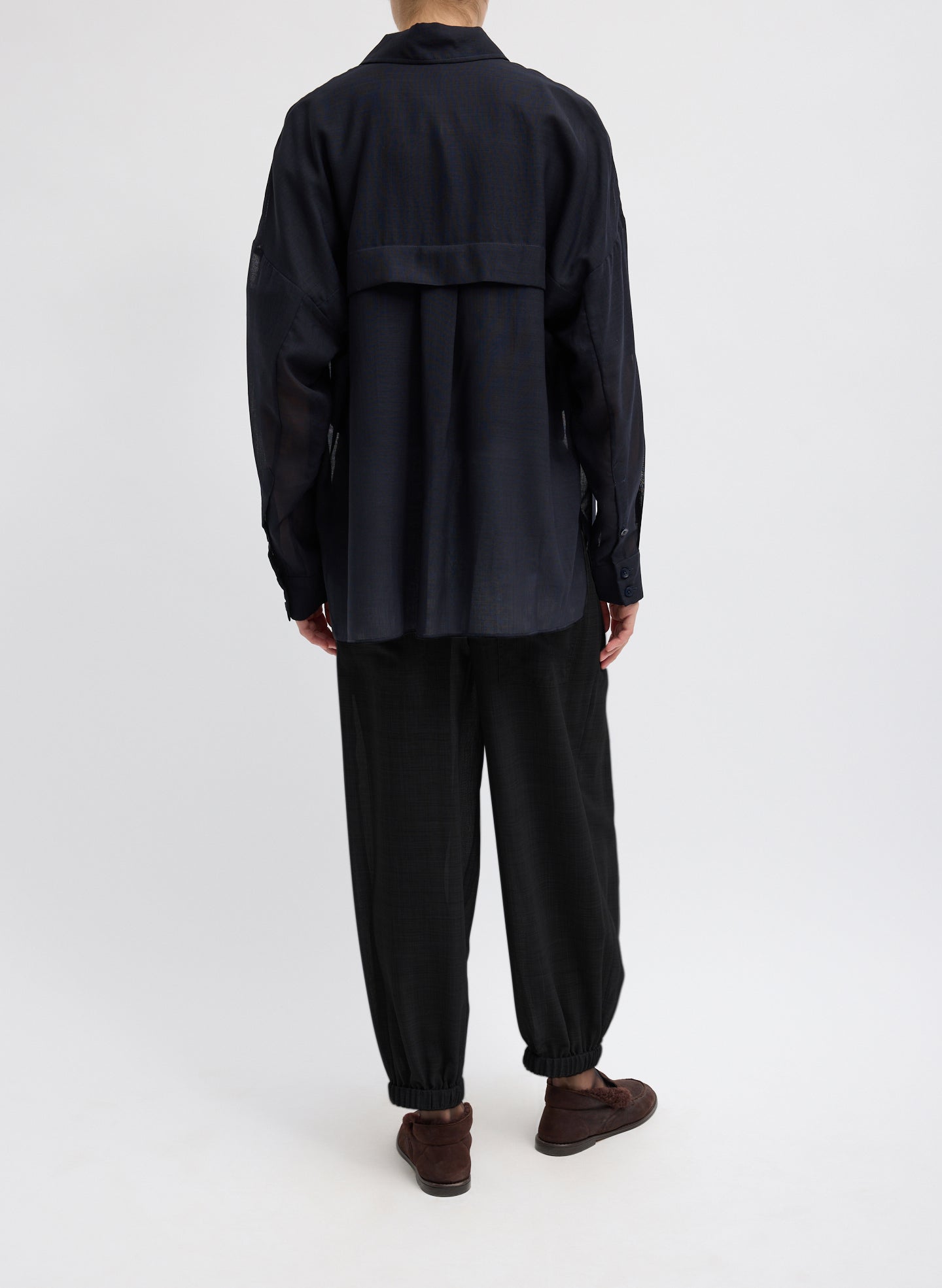 Black Sheer Wool Gauze Pleated Long Balloon Pant – relaxed fit, back view on model 