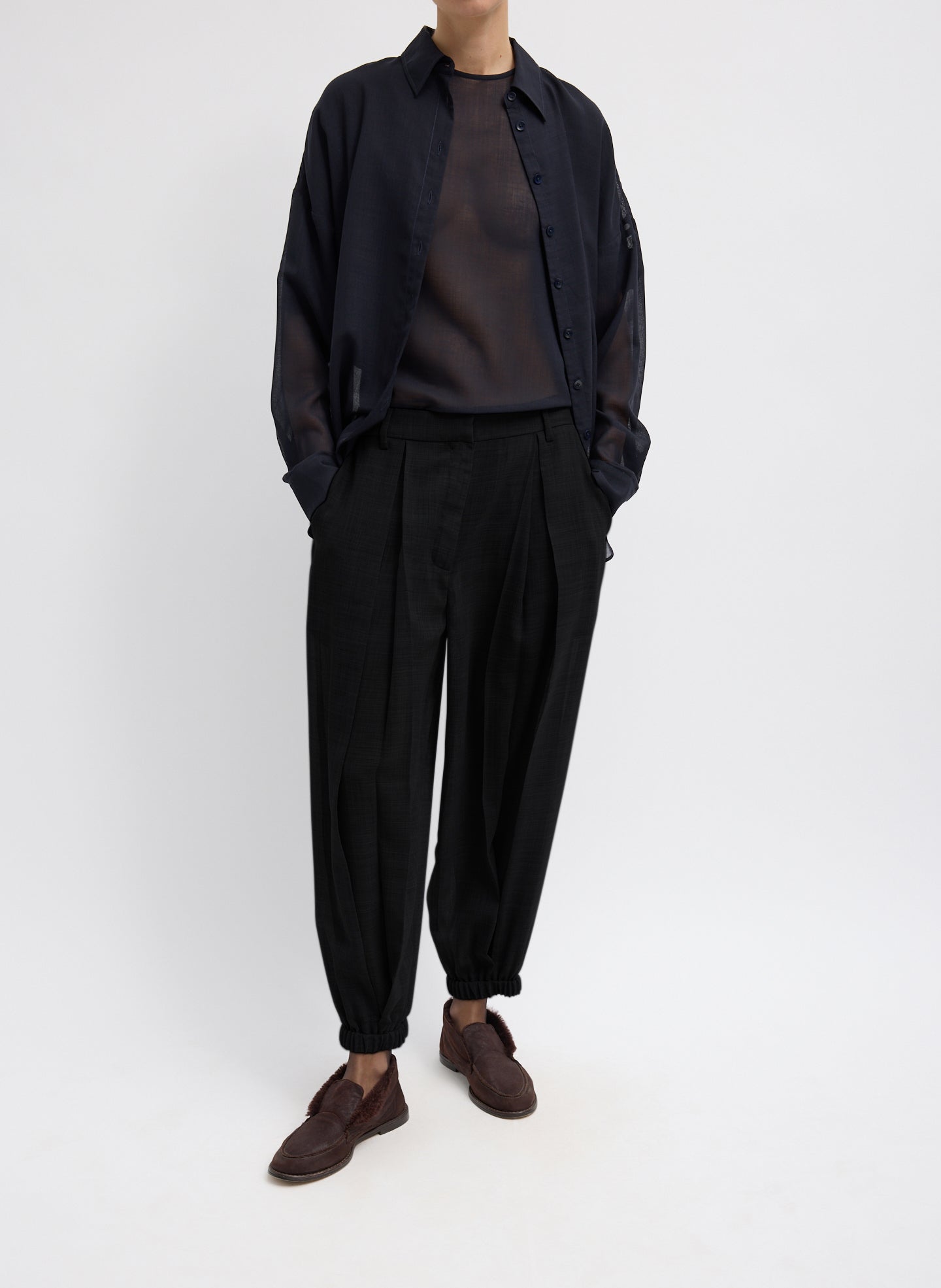 Sheer Wool Gauze Pleated Long Balloon Pant - Black Sheer Wool Gauze Pleated Long Balloon Pant – relaxed fit, front view on model 