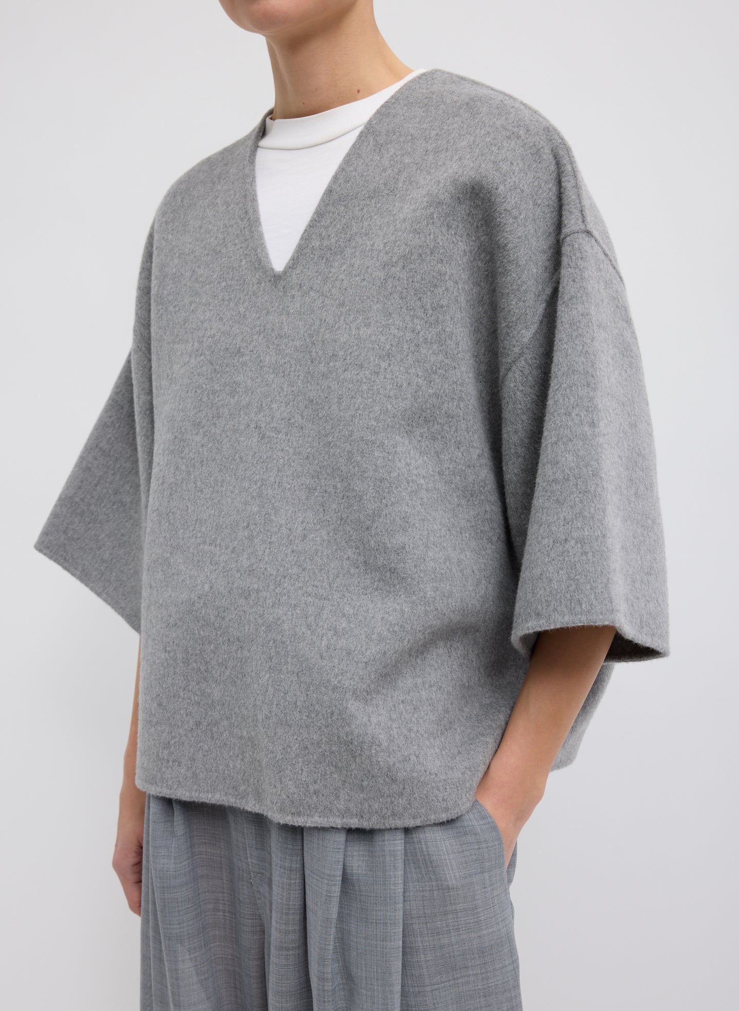 Medium Heather Grey Luxe Double Faced Wool Angora V-Neck Top – Closeup front view on model 