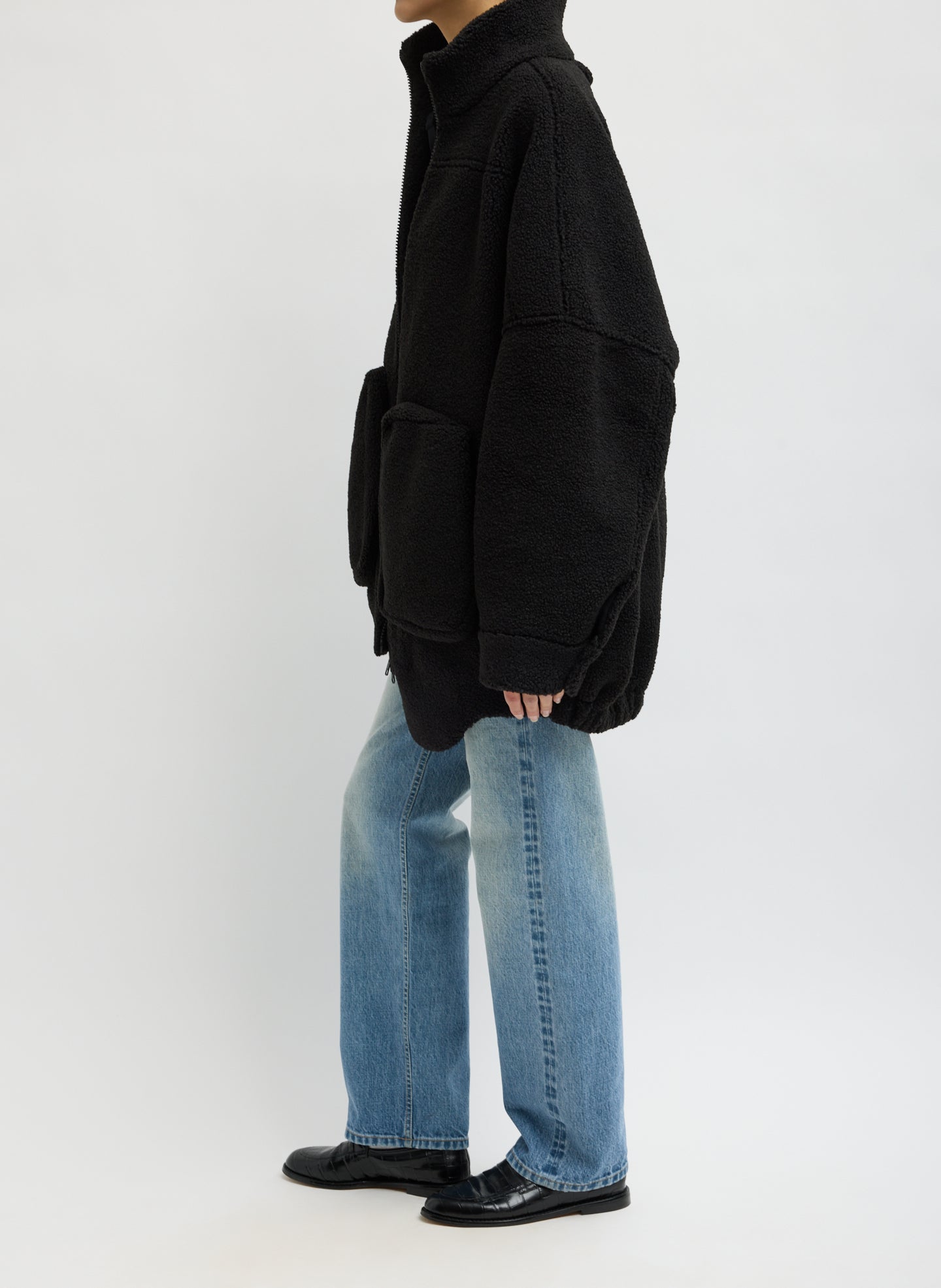 Black Cozy Fleece Zip Up Bomber Jacket - side view on model