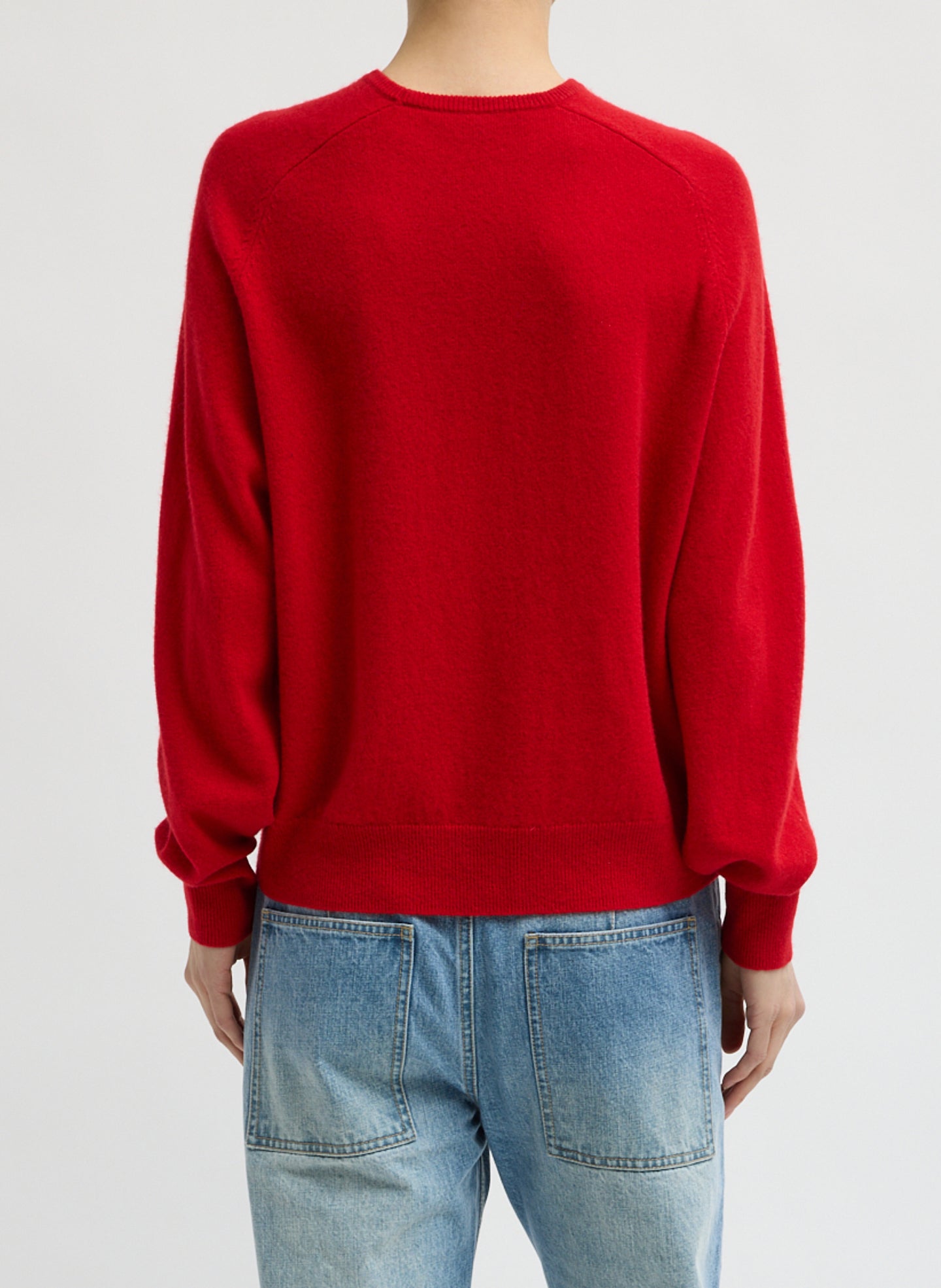 Red Feather Weight Cashmere Sweater - thin crewneck sweater, back view on model