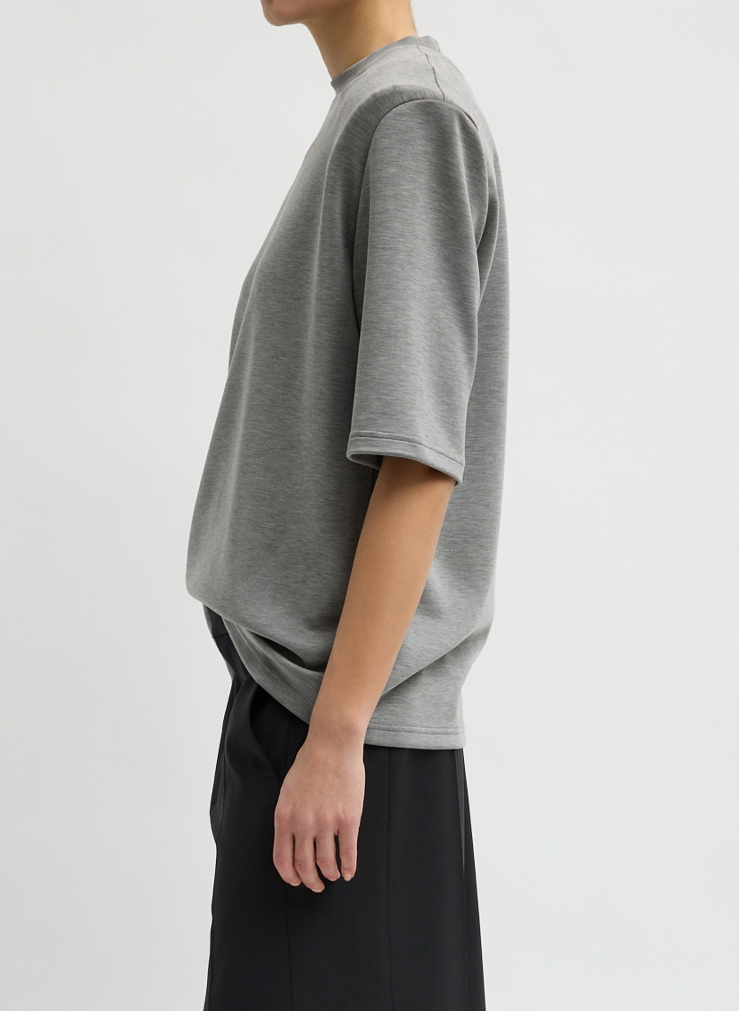Grey Feather Weight Viscose Neoprene Removable Shoulder Pad Top - short sleeve t-shirt, side view on model