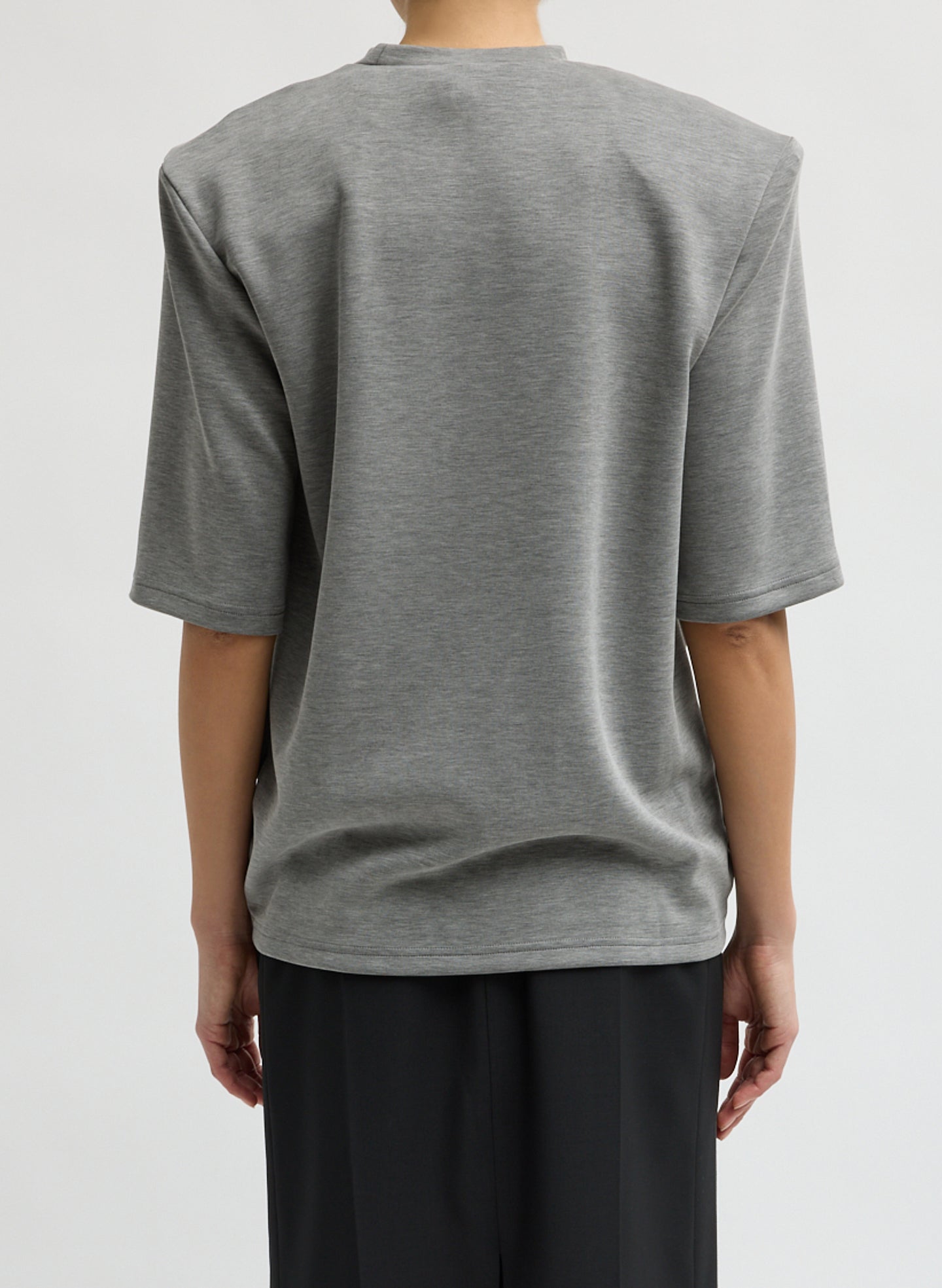 Grey Feather Weight Viscose Neoprene Removable Shoulder Pad Top - short sleeve t-shirt, back view on model